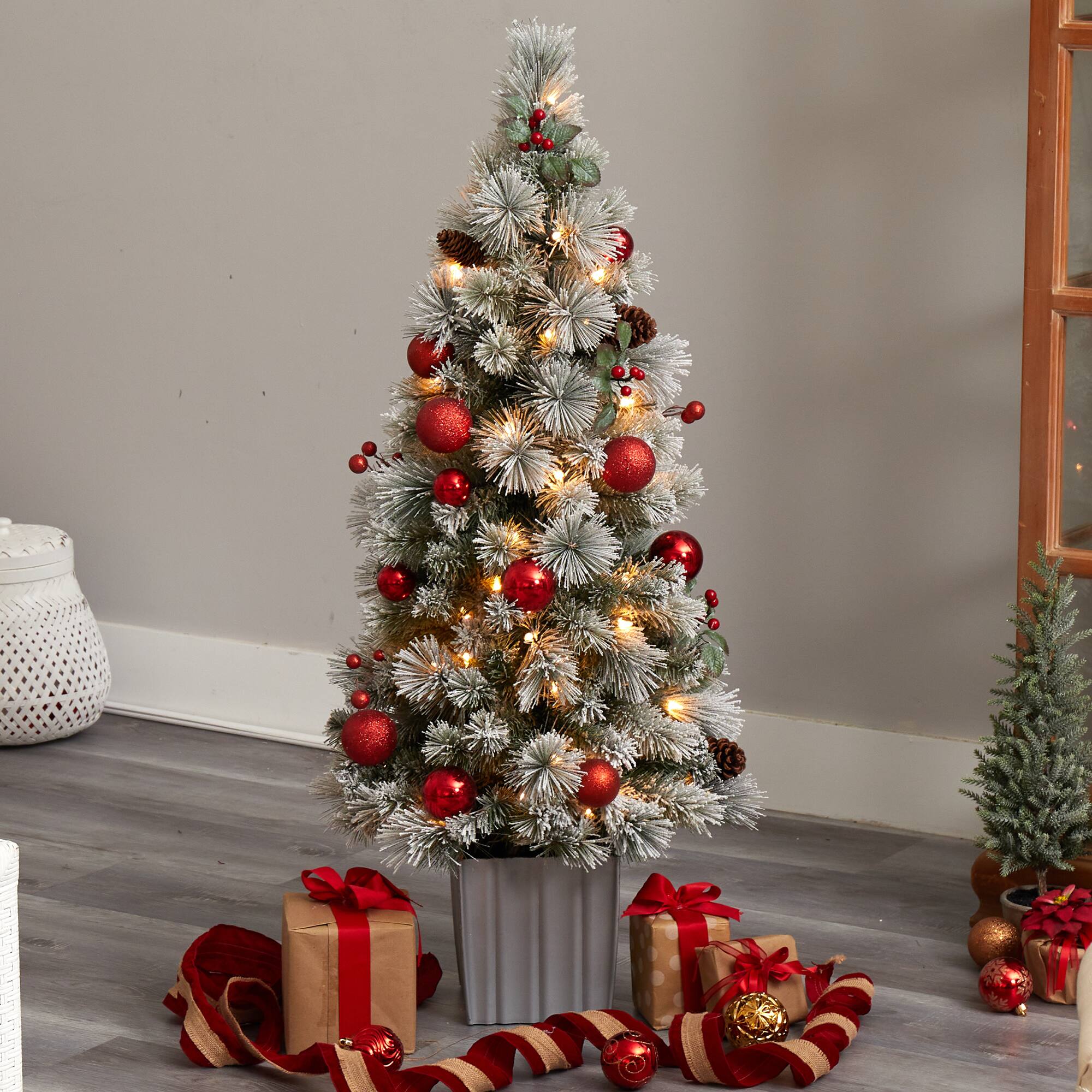 4ft. Pre-Lit Winter Flocked Artificial Christmas Tree in Decorative Planter, White LED Lights