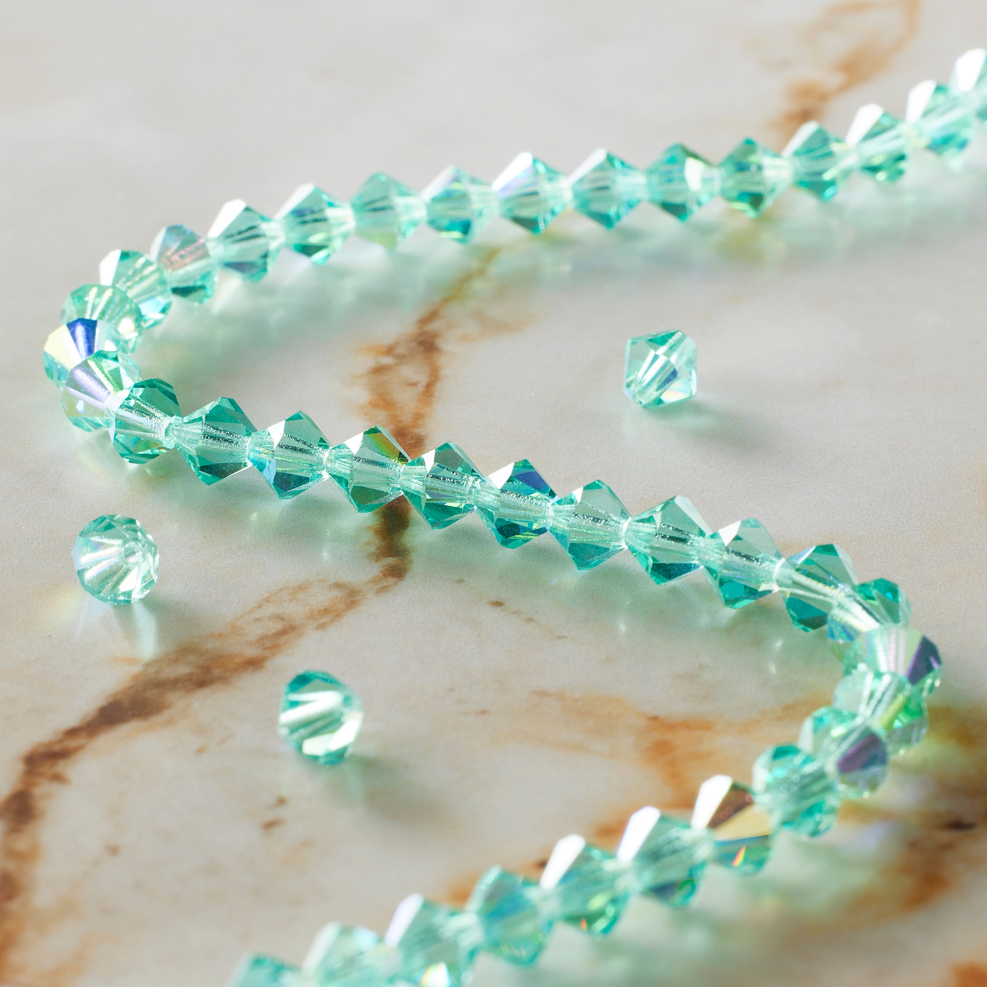 12 Pack: Preciosa Glass Crystal Bicone Beads, 6mm by Bead Landing&#x2122;