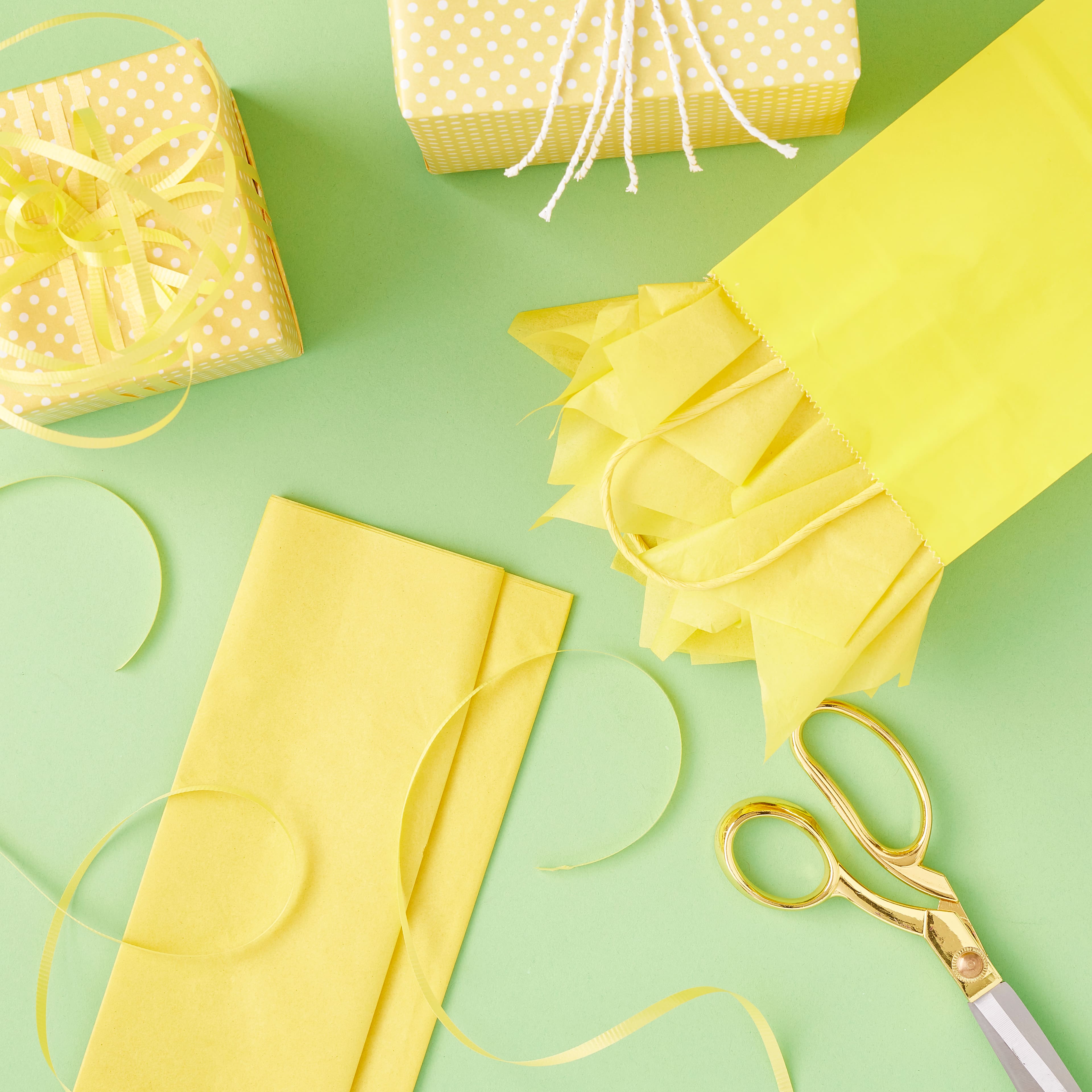 24 Packs: 12 ct. (288 total) Yellow Tissue Paper by Celebrate It&#x2122;