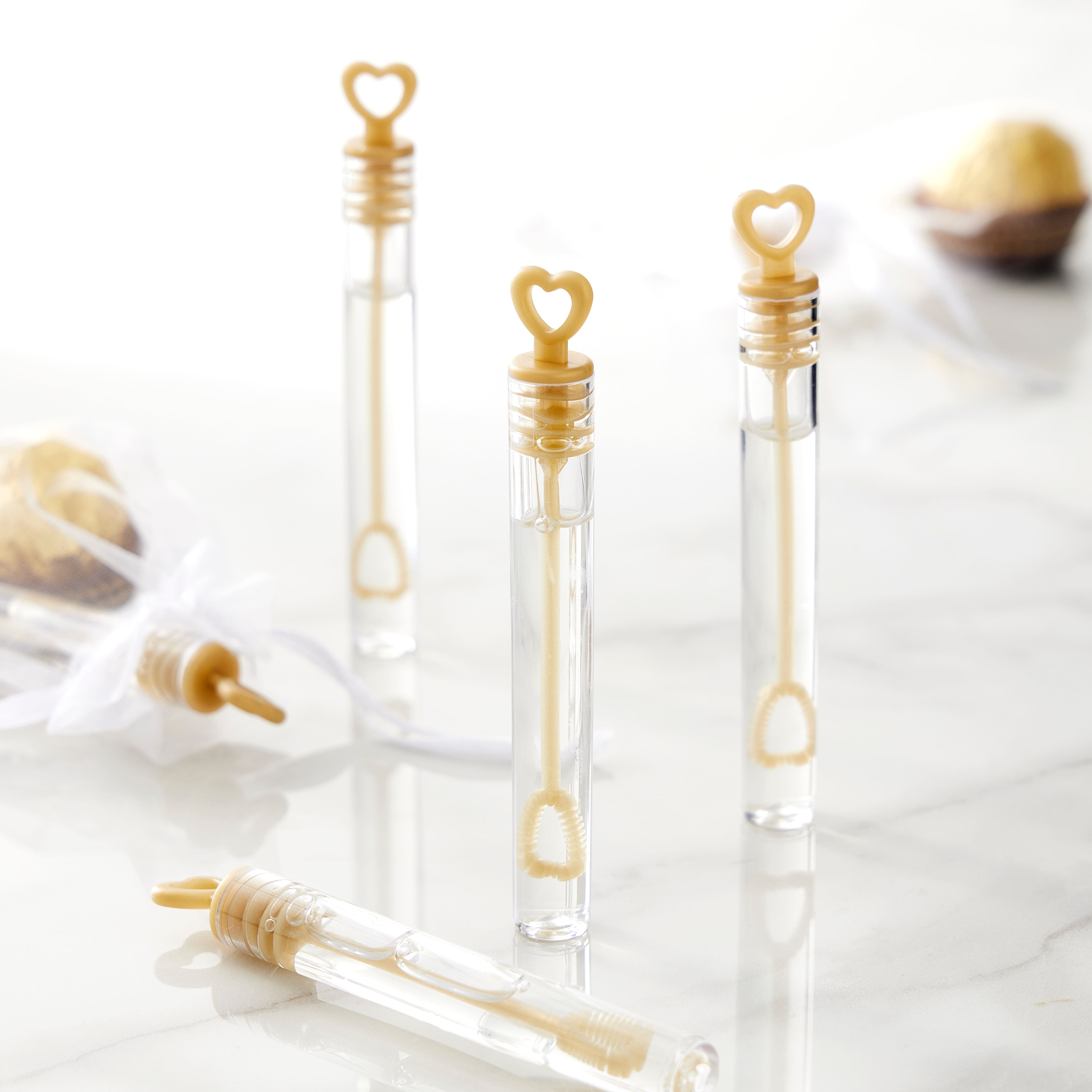 6 Packs: 100 ct. (600 total) Gold & Clear Heart Bubble Wands by Celebrate It™
