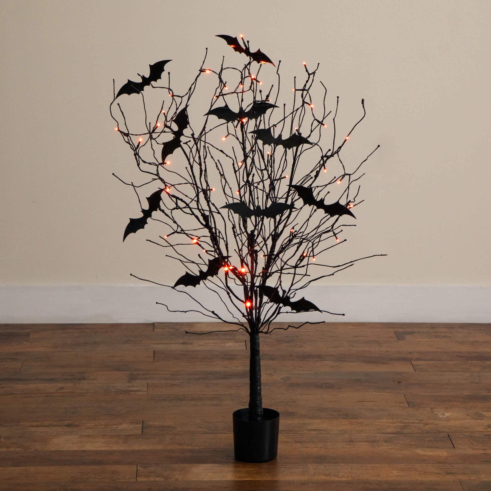 4ft. Pre-Lit Artificial Halloween Black Twig Tree with Bats and 50 Orange LED Lights