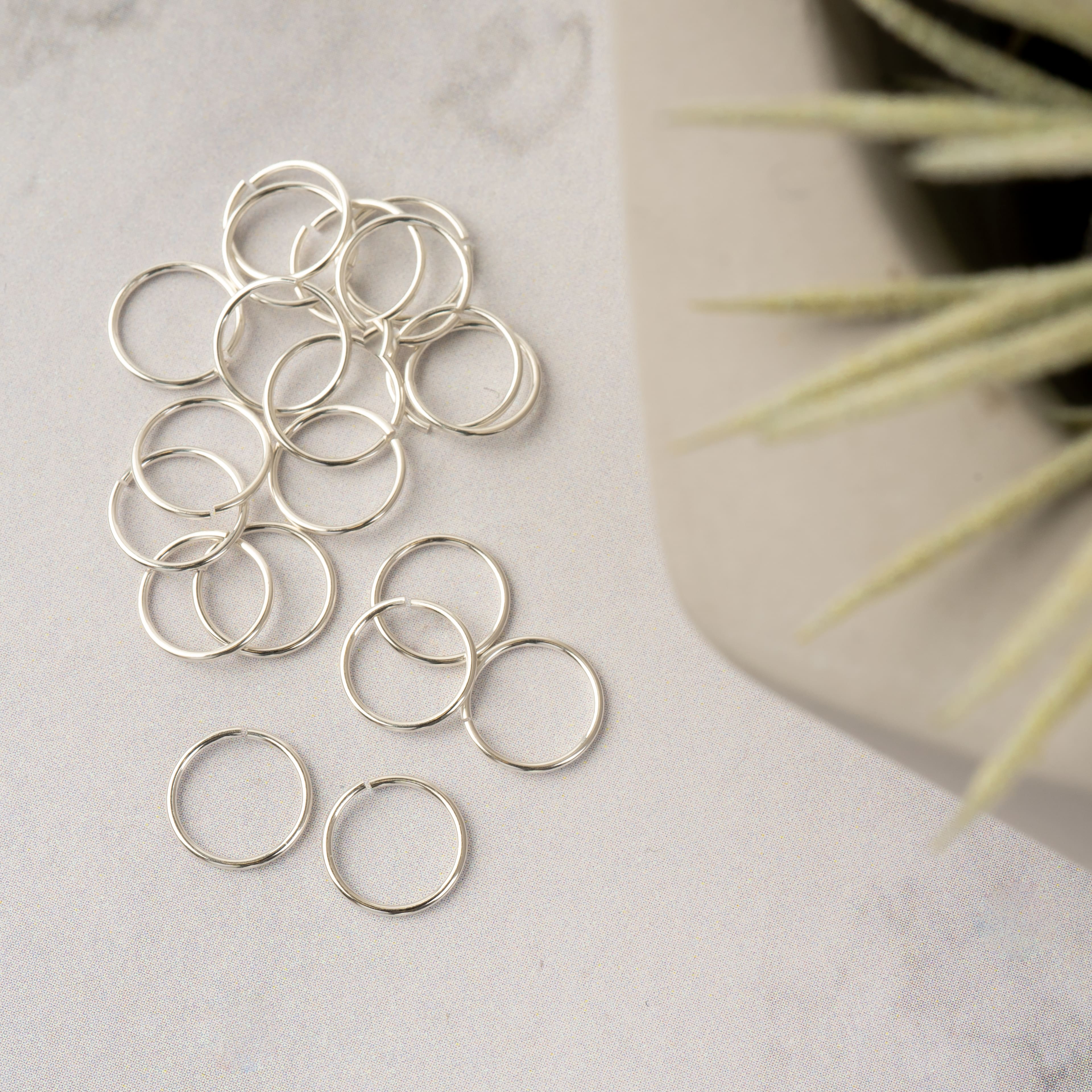 6 Packs: 20 ct. (120 total) 8mm Sterling Silver Jump Rings by Bead Landing&#x2122;