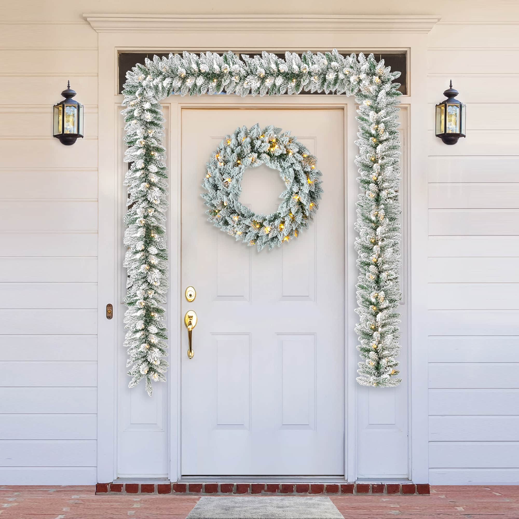 Glitzhome&#xAE; 6ft. Pre-Lit Snow Flocked Christmas Garland, 2ct.