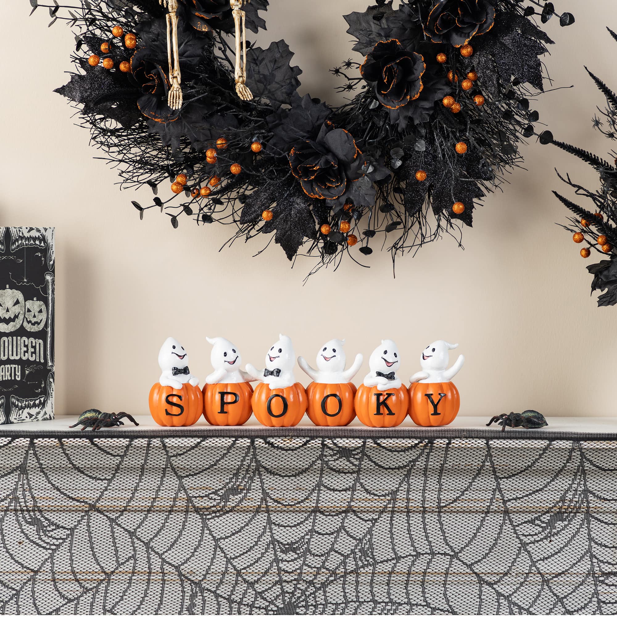 Glitzhome&#xAE; 15.5&#x22;L Halloween Polyresin SPOOKY Ghost Pumpkin Table Decor