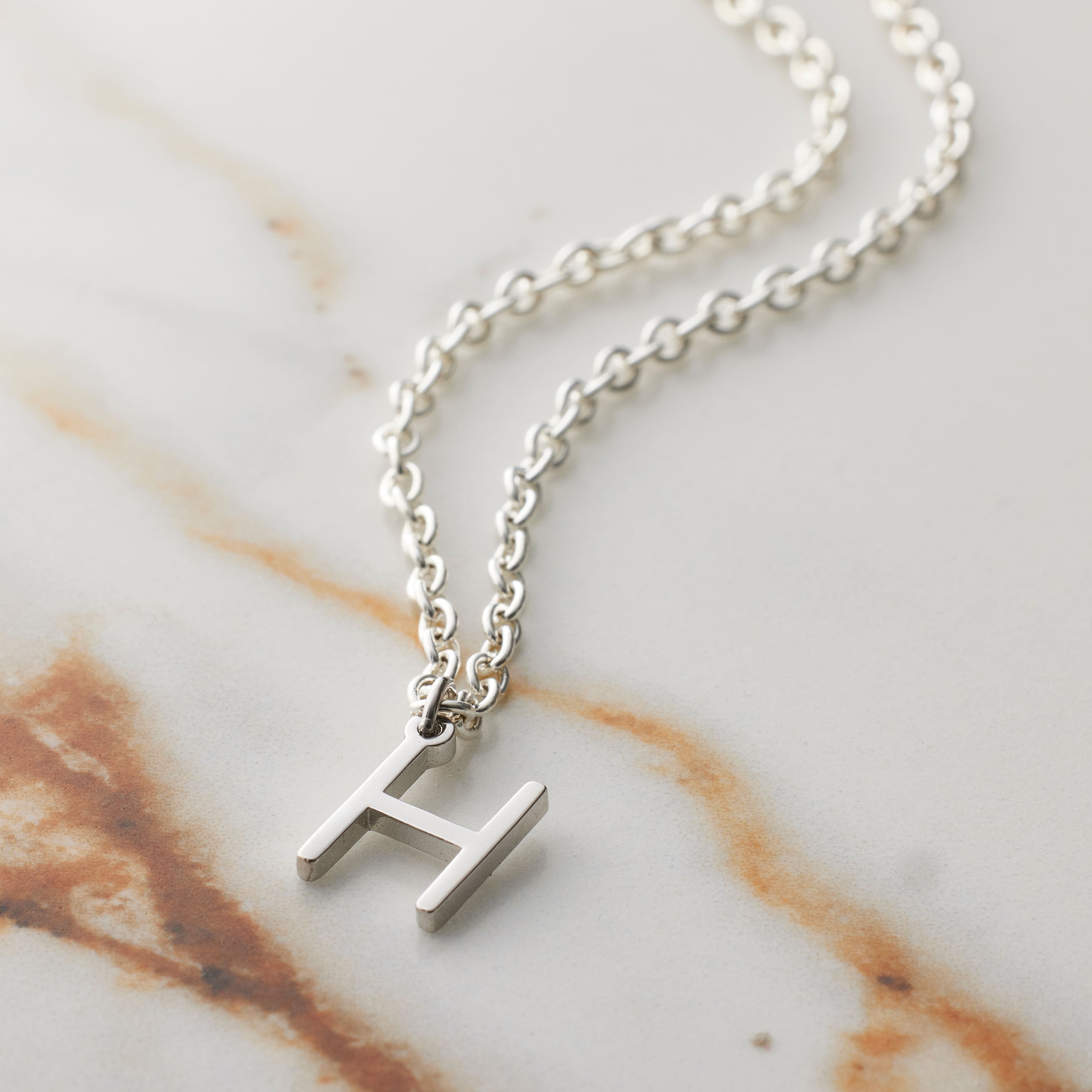 12 Pack: Sterling Silver Alphabet Charm by Bead Landing™