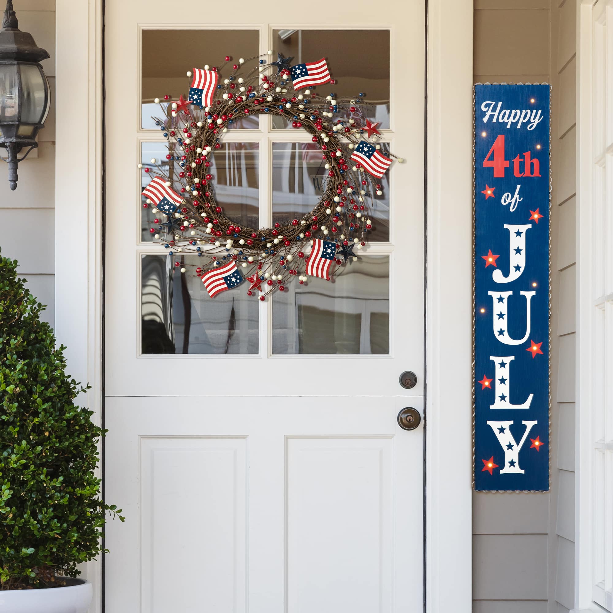 Glitzhome® 22" Americana Flag & Berry Wreath
