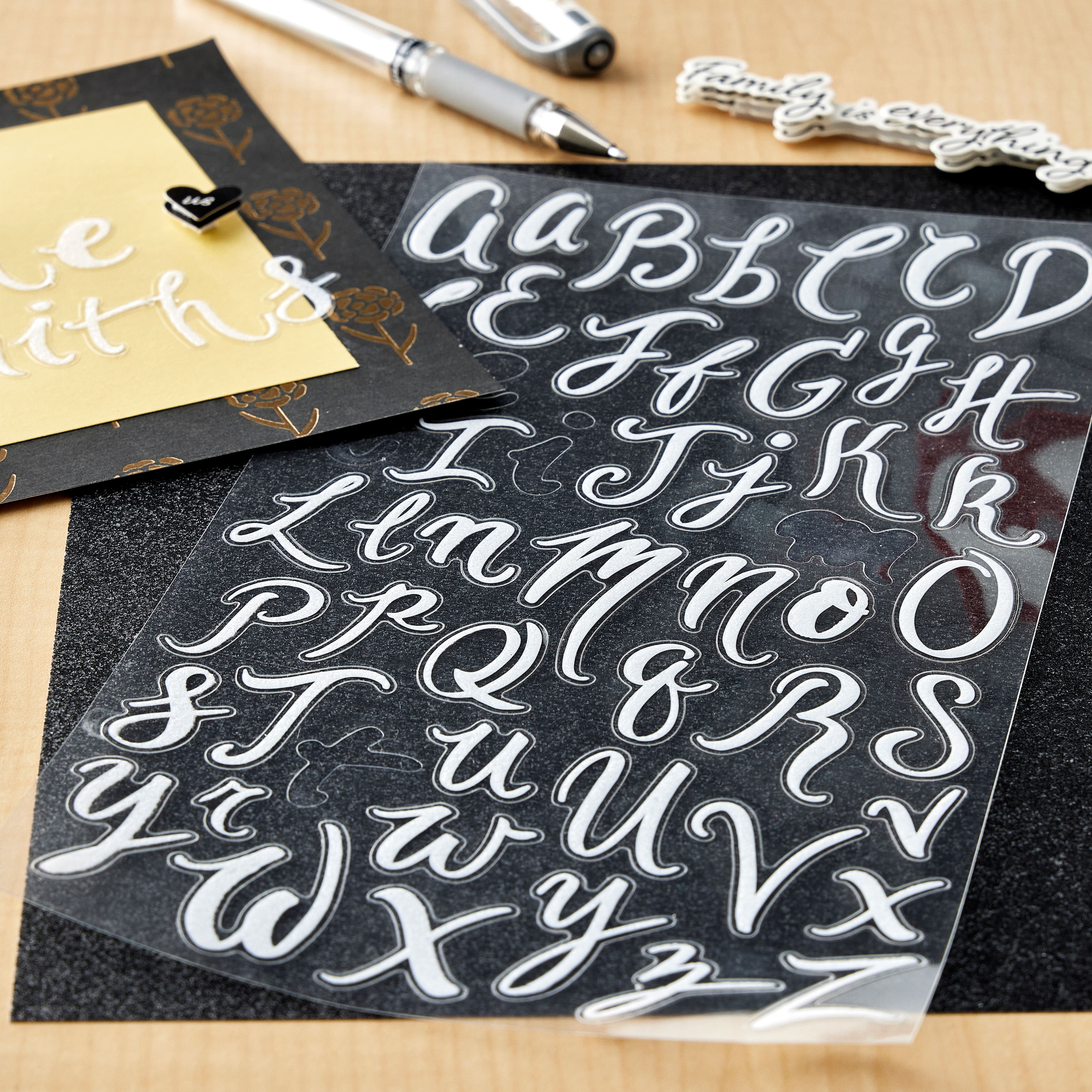 12 Packs: 104 ct. (1,248 total) White Glitter Script Alphabet Stickers by Recollections™