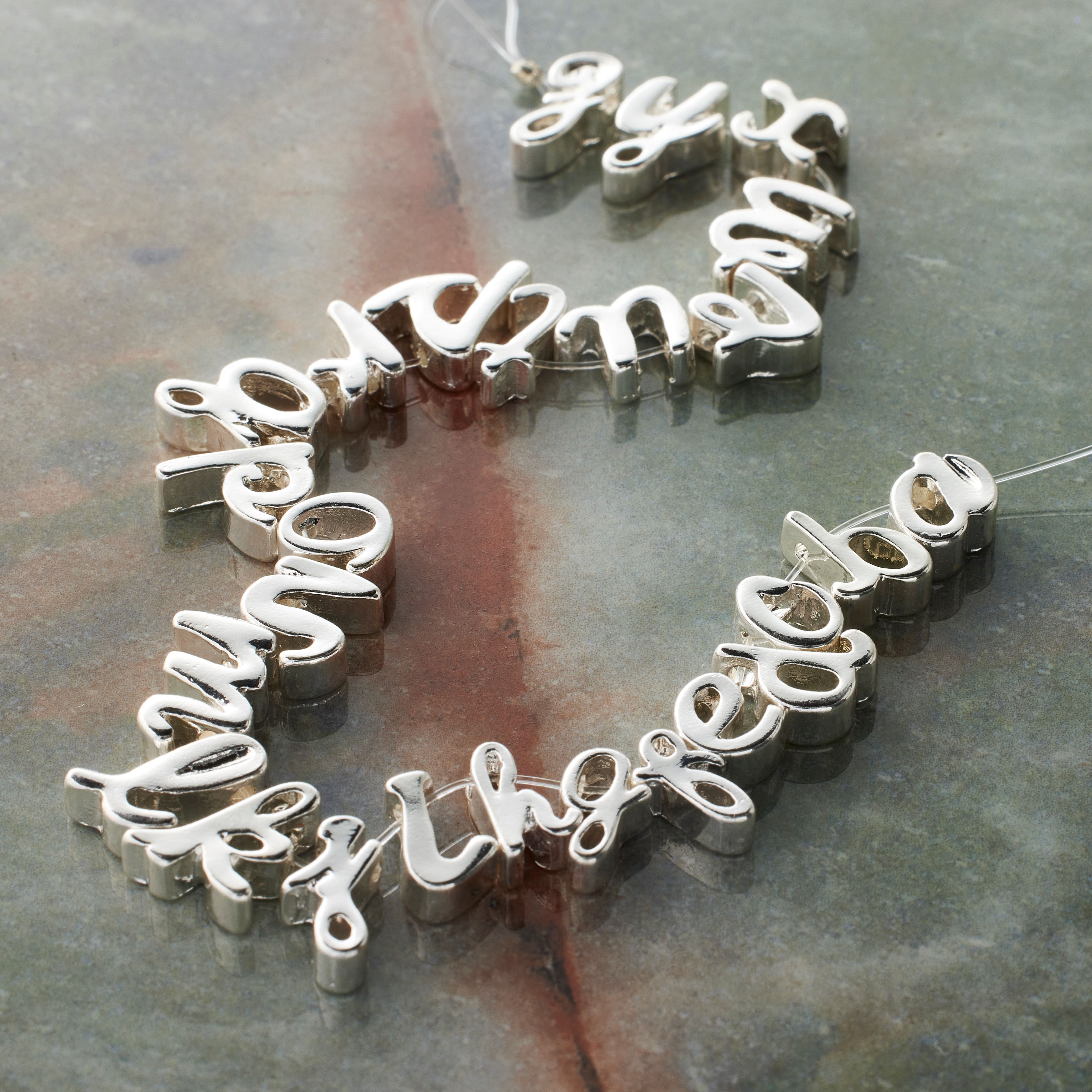 12 Packs: 26 ct. (312 total) Silver Alphabet Beads by Bead Landing™