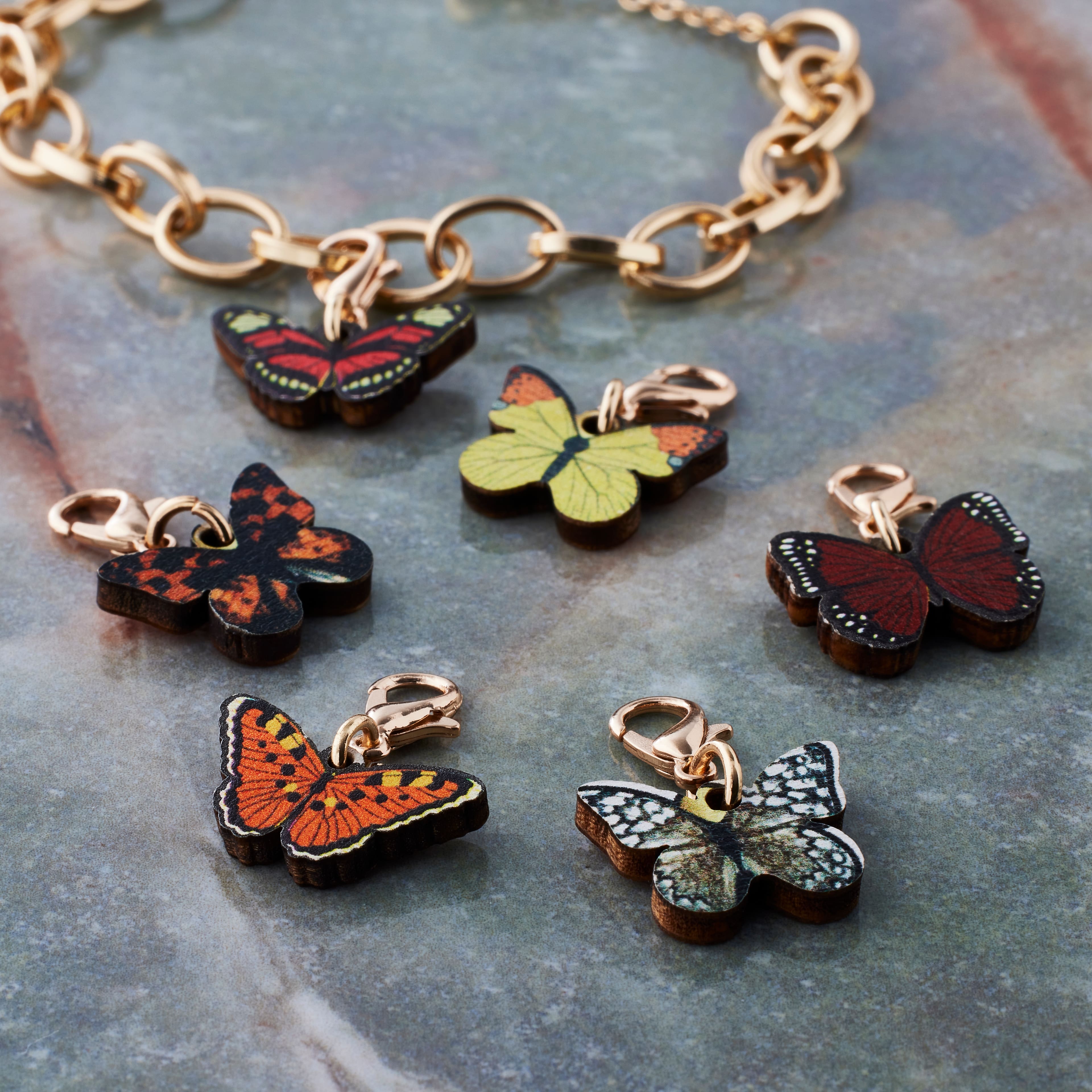 12 Packs: 6 ct. (72 total) Wood Butterfly Charms by Bead Landing™