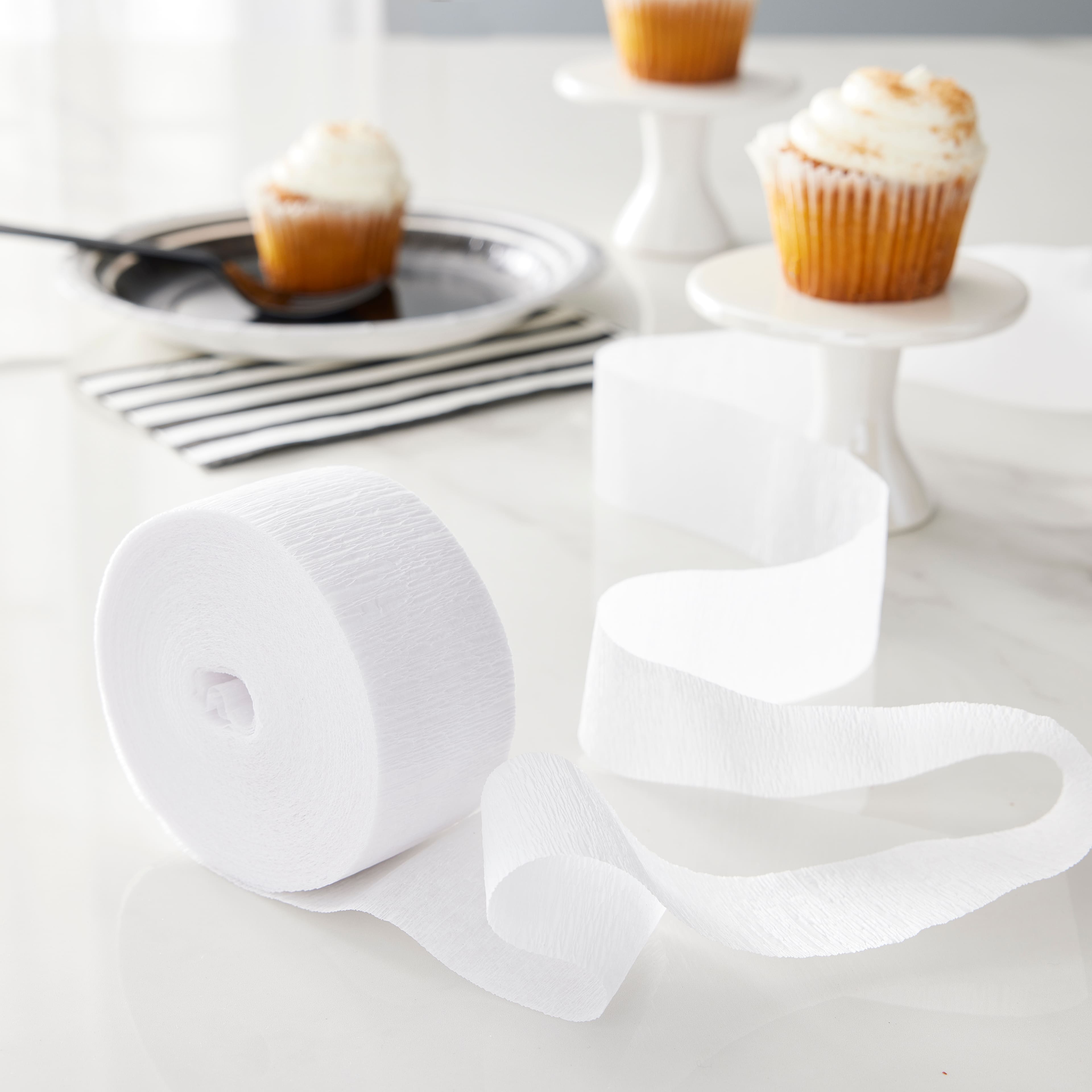 12 Pack: 81ft. White Crepe Streamer by Celebrate It™