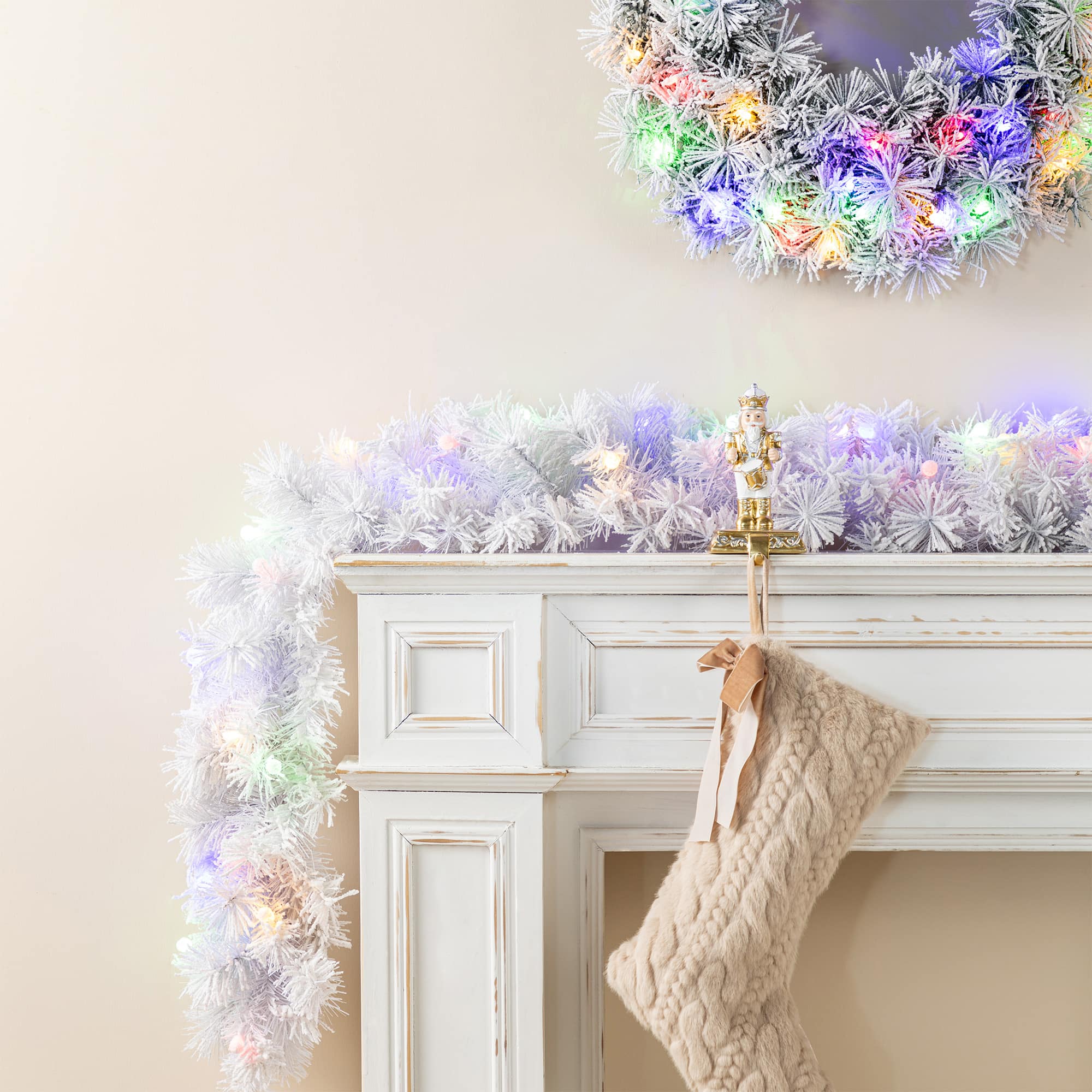 Glitzhome® 9ft Pre-Lit Snow Flocked White Pine Christmas Garland with Timer