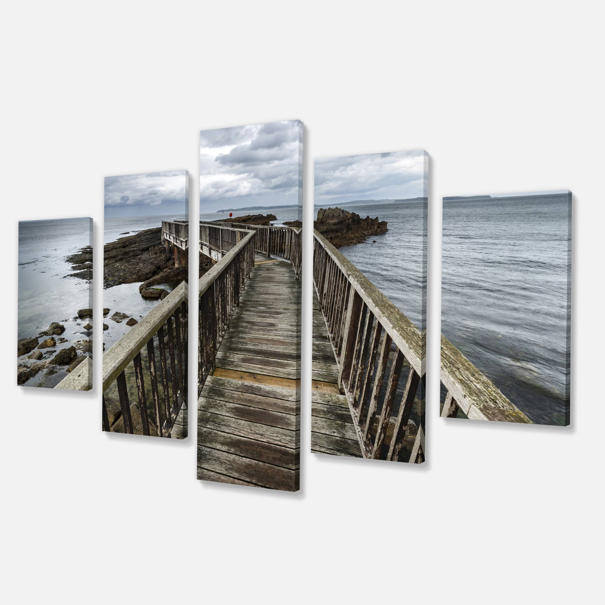 Designart - Wooden Pier on North Irish Coastline - Sea Bridge Canvas Art Print