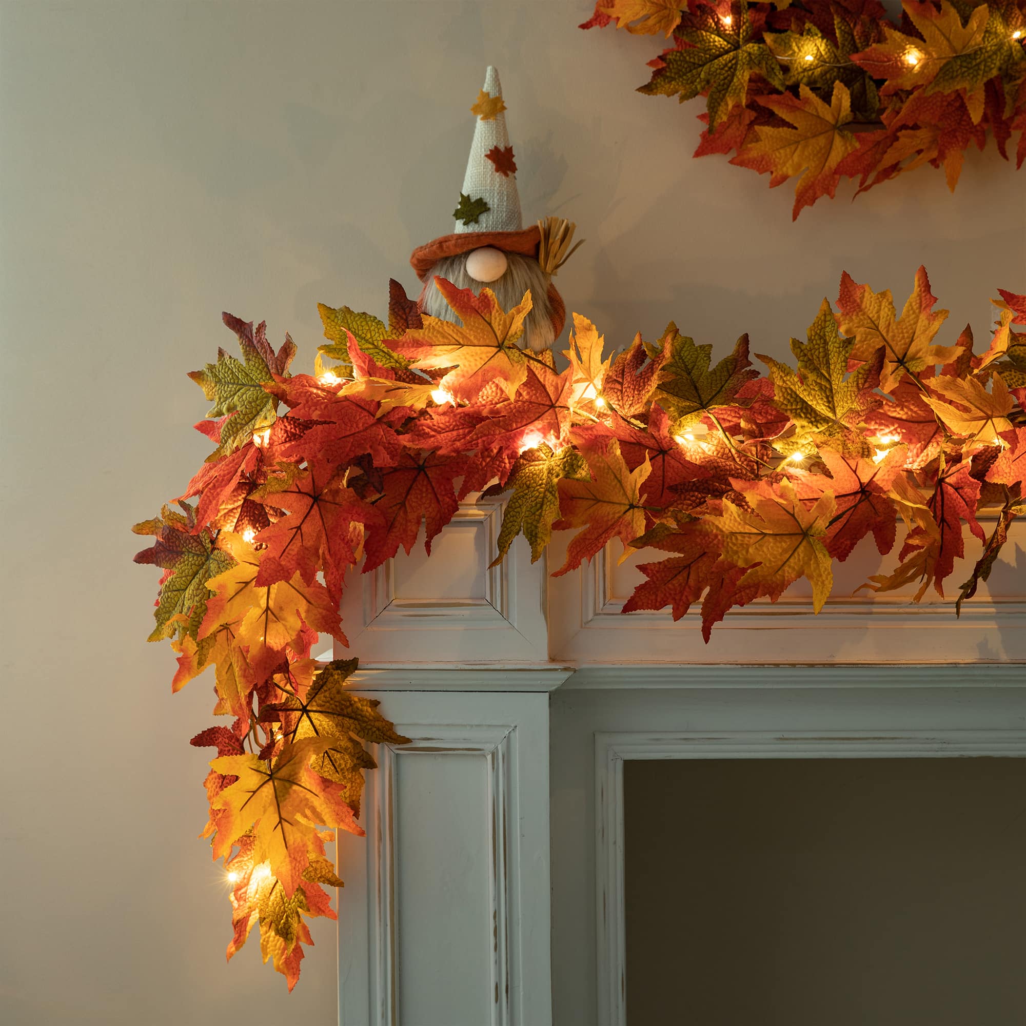 Glitzhome&#xAE; 6ft. Fall Lighted Maple Leaves Garland with Timer