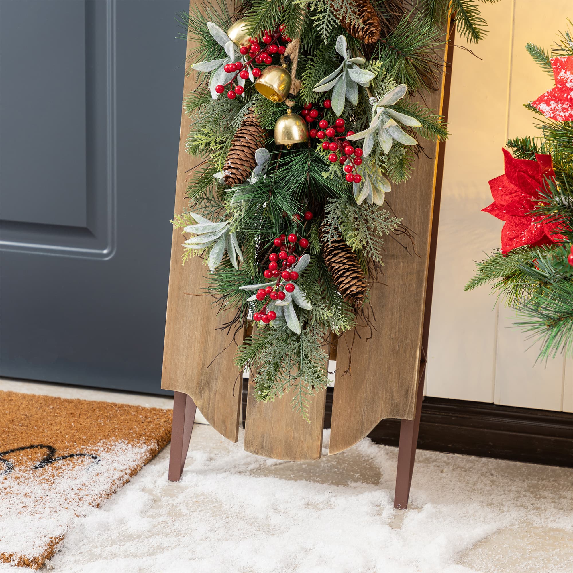 Glitzhome&#xAE; 34.25&#x22;&#xA0;Wooden Natural Christmas Sleigh Porch Decor