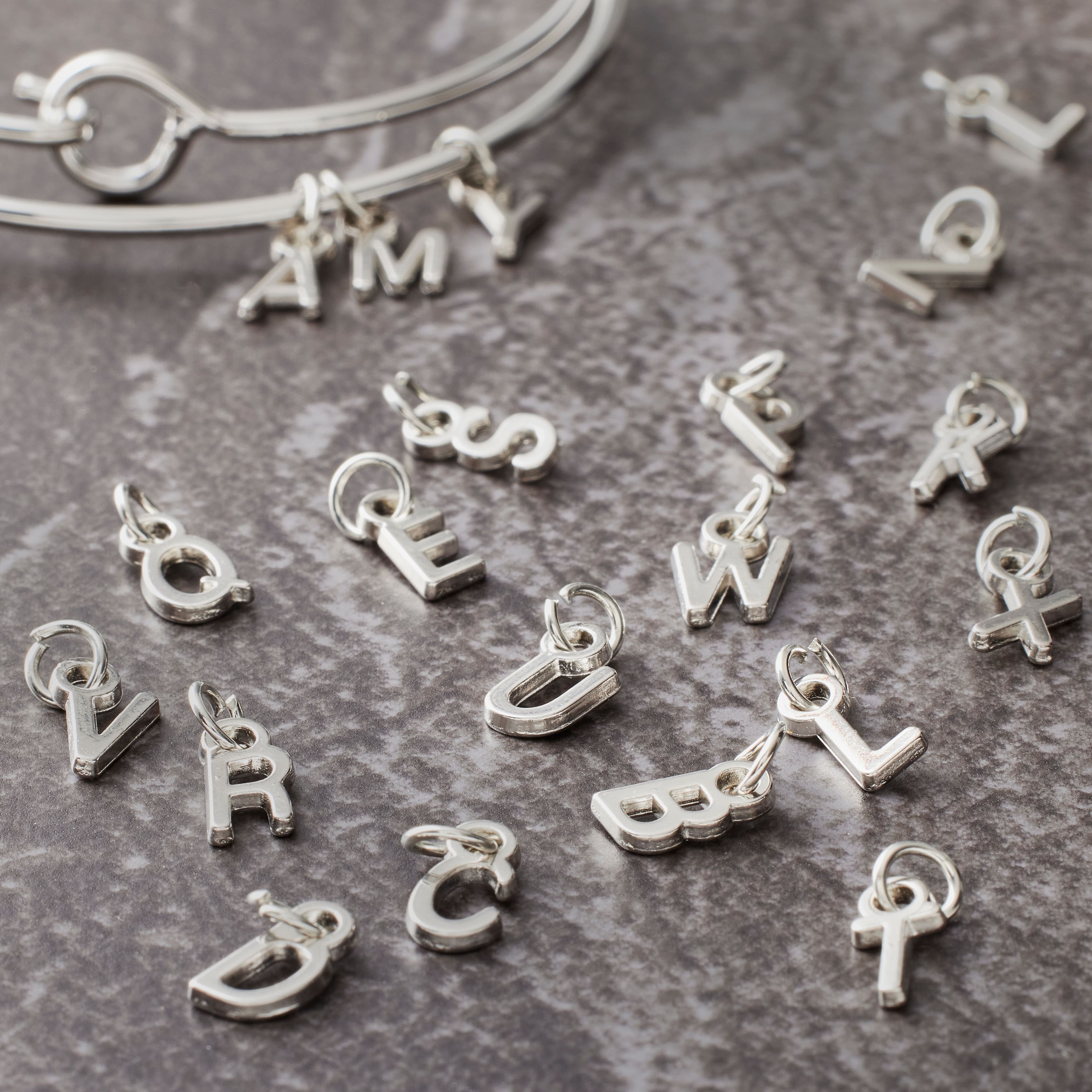 12 Packs: 26 ct. (312 total) Mini Rhodium-Colored Alphabet Capitals Charms by Bead Landing&#x2122;