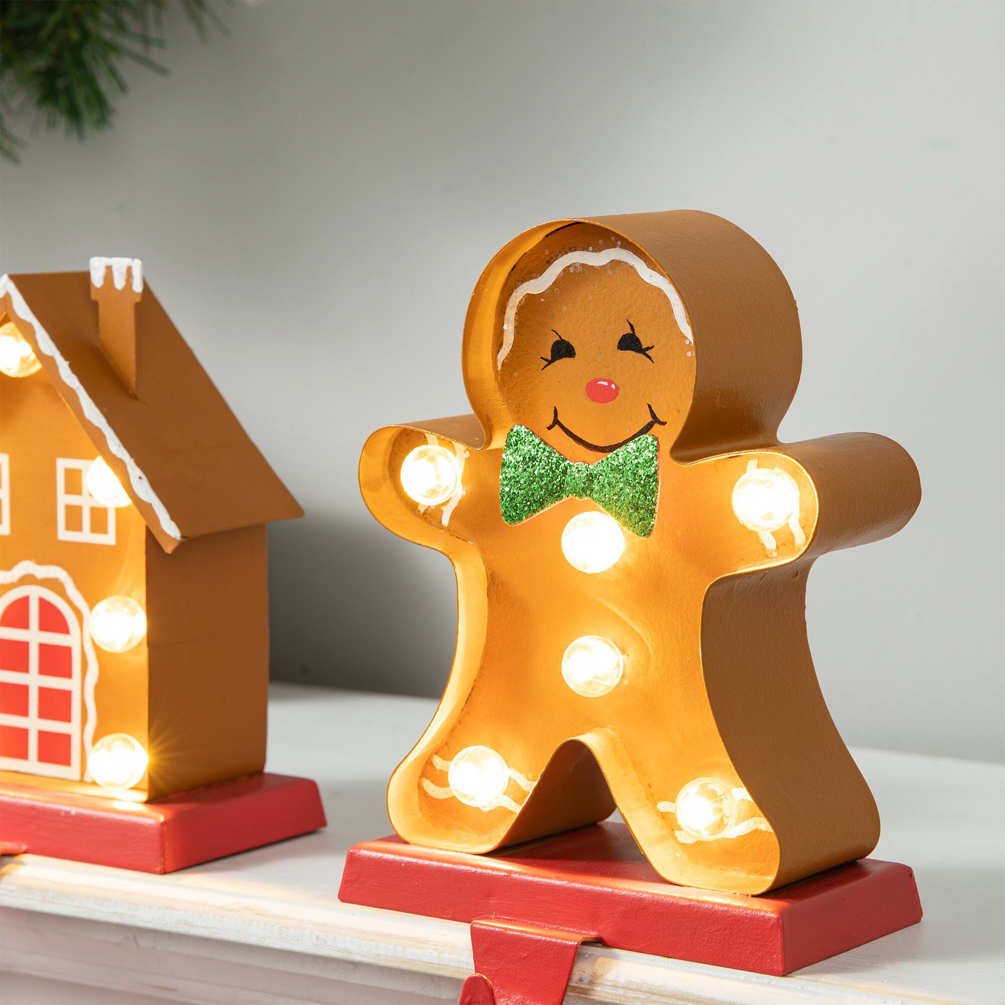 Glitzhome&#xAE; Marquee LED Gingerbread House &#x26; Gingerbread Man Christmas Stocking Holder Set