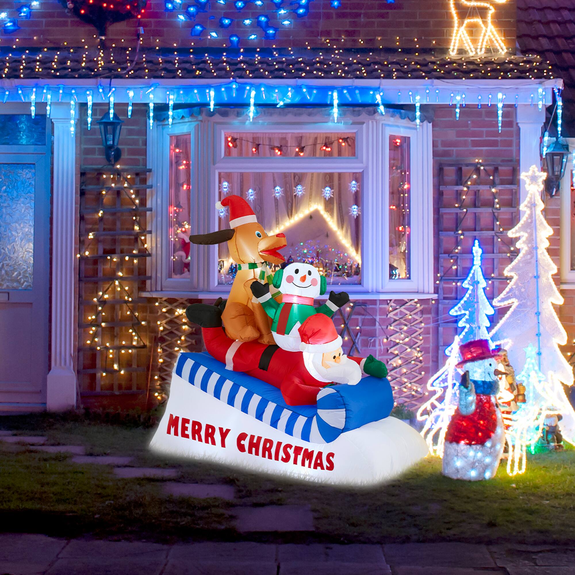 Glitzhome&#xAE; 6FT Lighted Inflatable Skiing Santa, Snowman &#x26; Dog