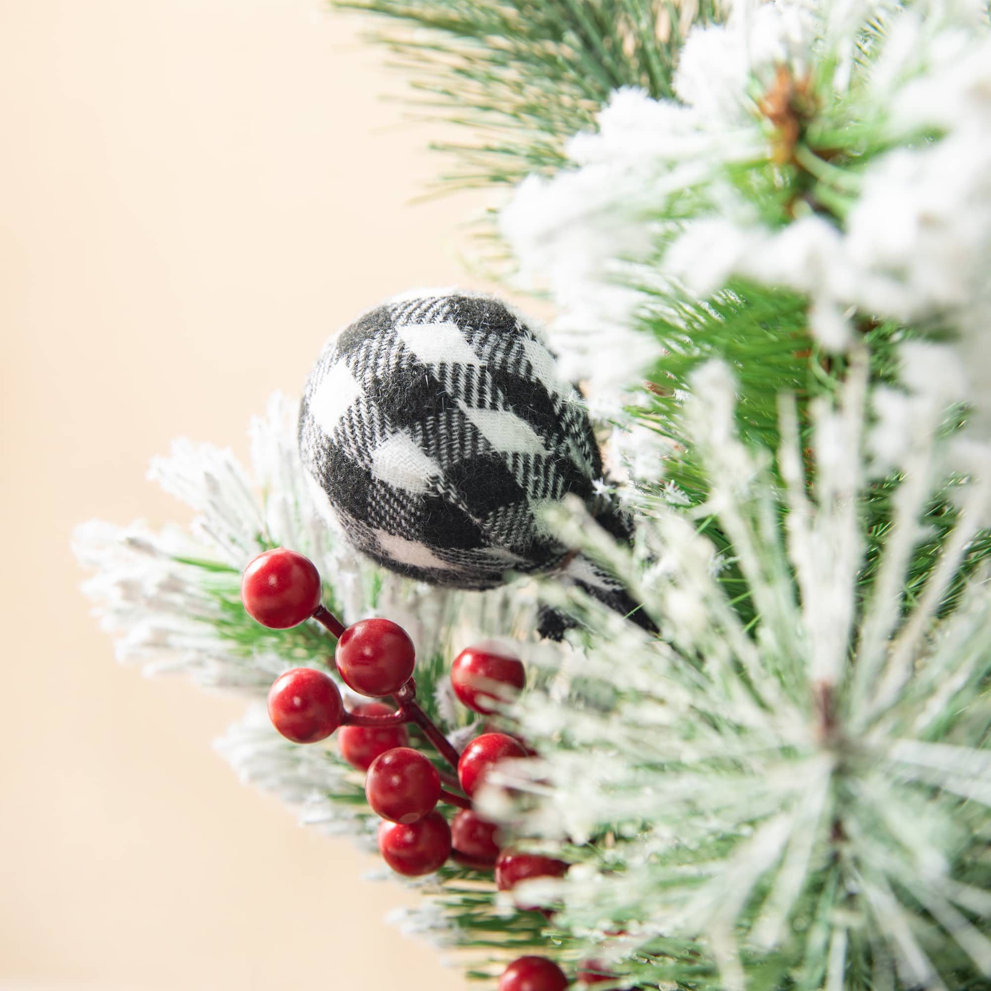 Glitzhome® 21" Flocked Pine & Berries Table Tree