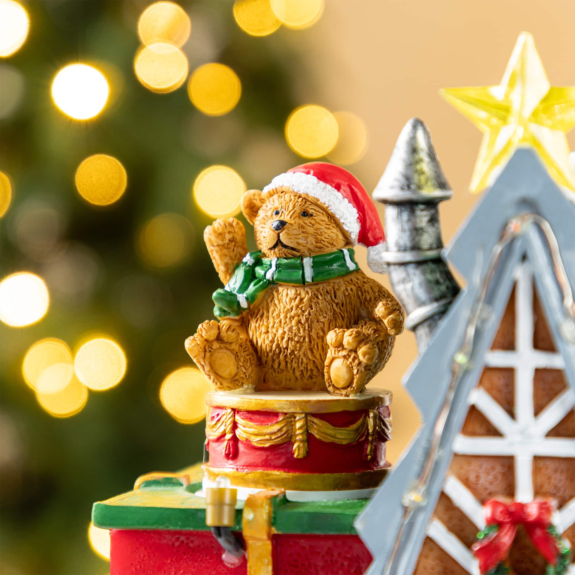 Glitzhome&#xAE; 10.75&#x22; Lighted CHRISTMAS TOY MARKET Resin Village with Movement and Music