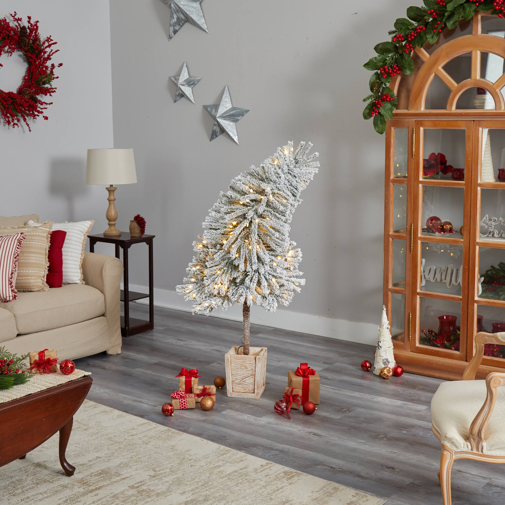 5ft. Pre-Lit Winter Flocked Leaning Artificial Christmas Tree in Decorative Planter, White LED Lights