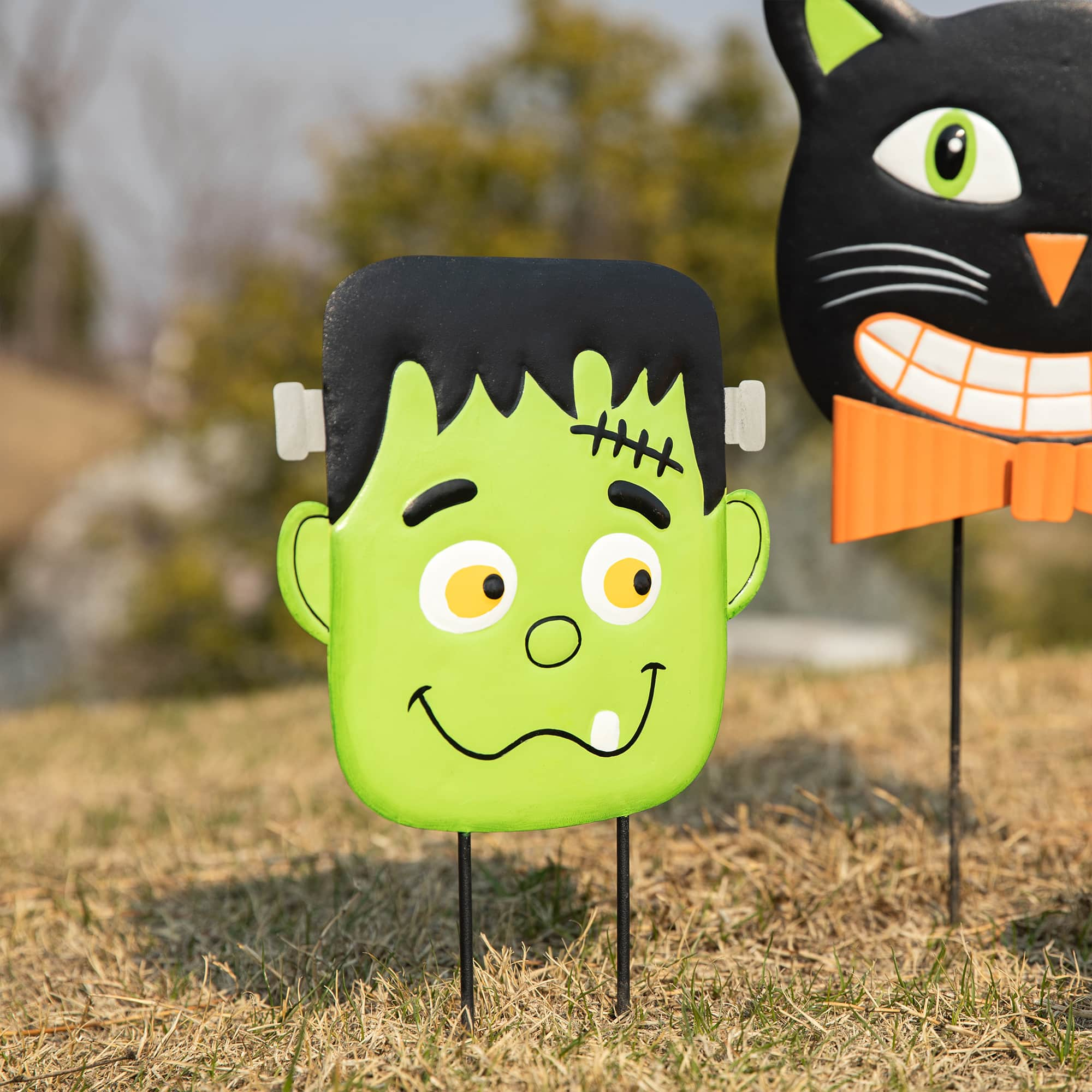 Glitzhome&#xAE; 3.5ft. Halloween Metal Stacked Ghost, Frankenstein, Black Cat and Pumpkin Yard Stake