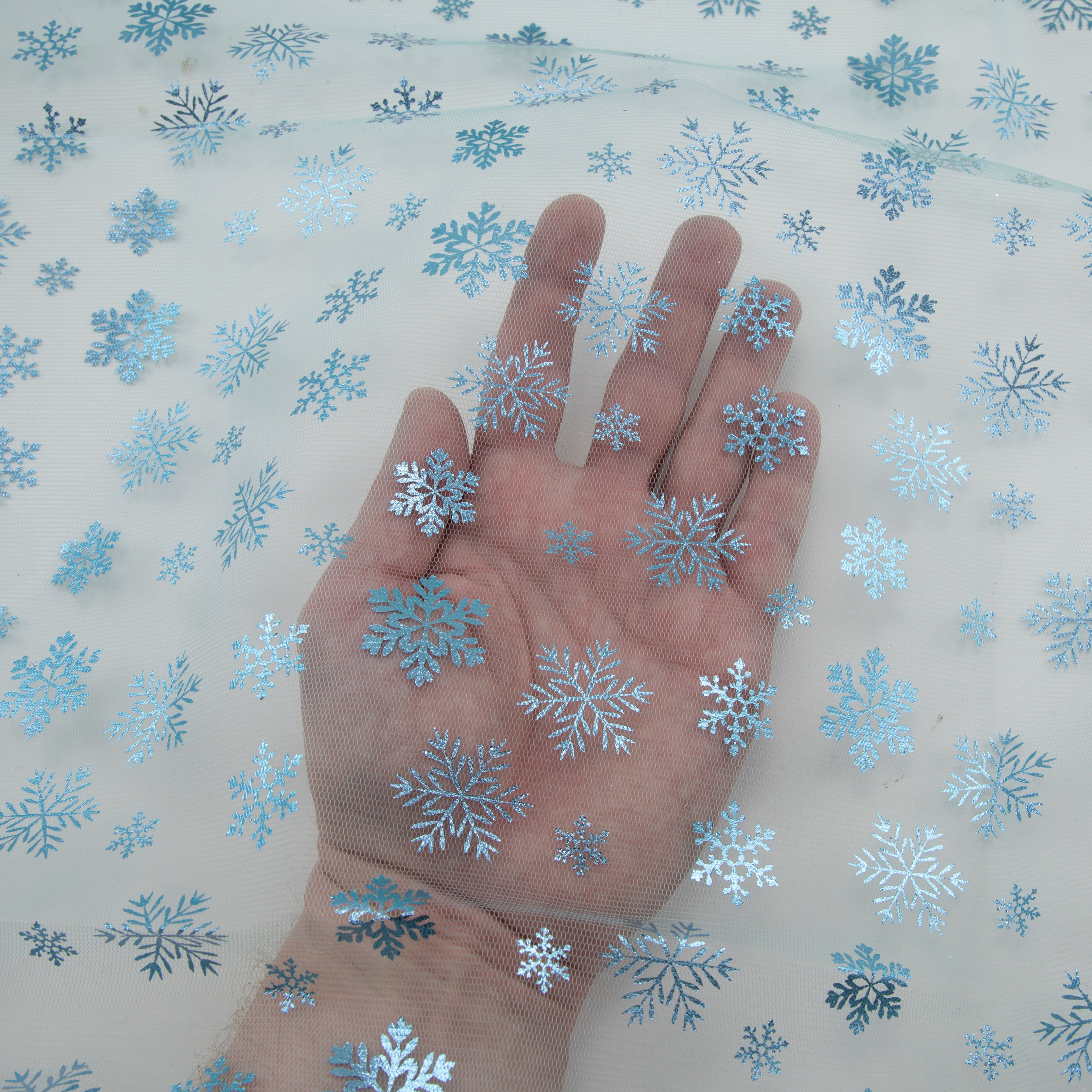 Blue Snowflakes on Blue Mesh