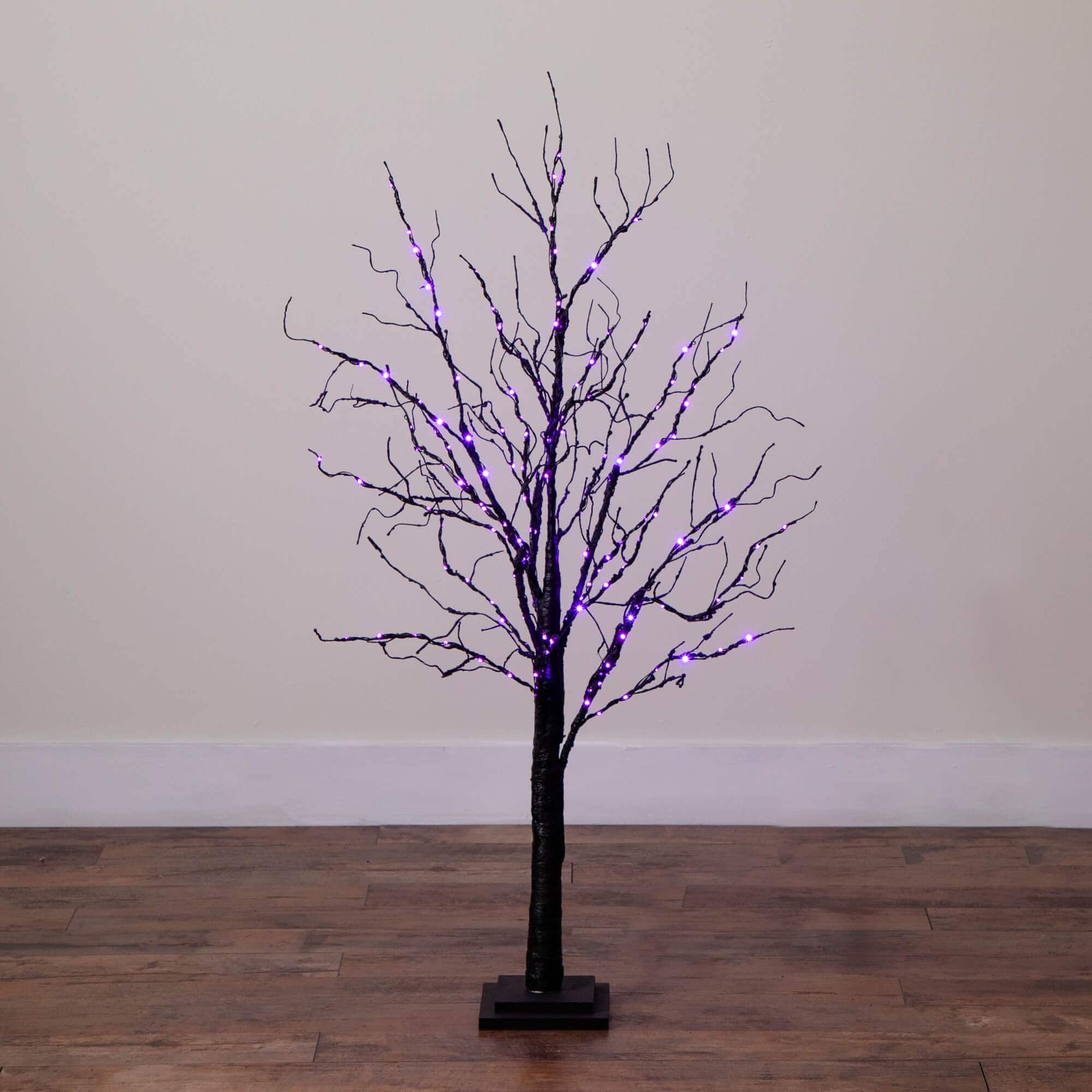 4ft. Pre-Lit Halloween Black Twig Artificial Tree with 180 Orange & Purple LED Lights