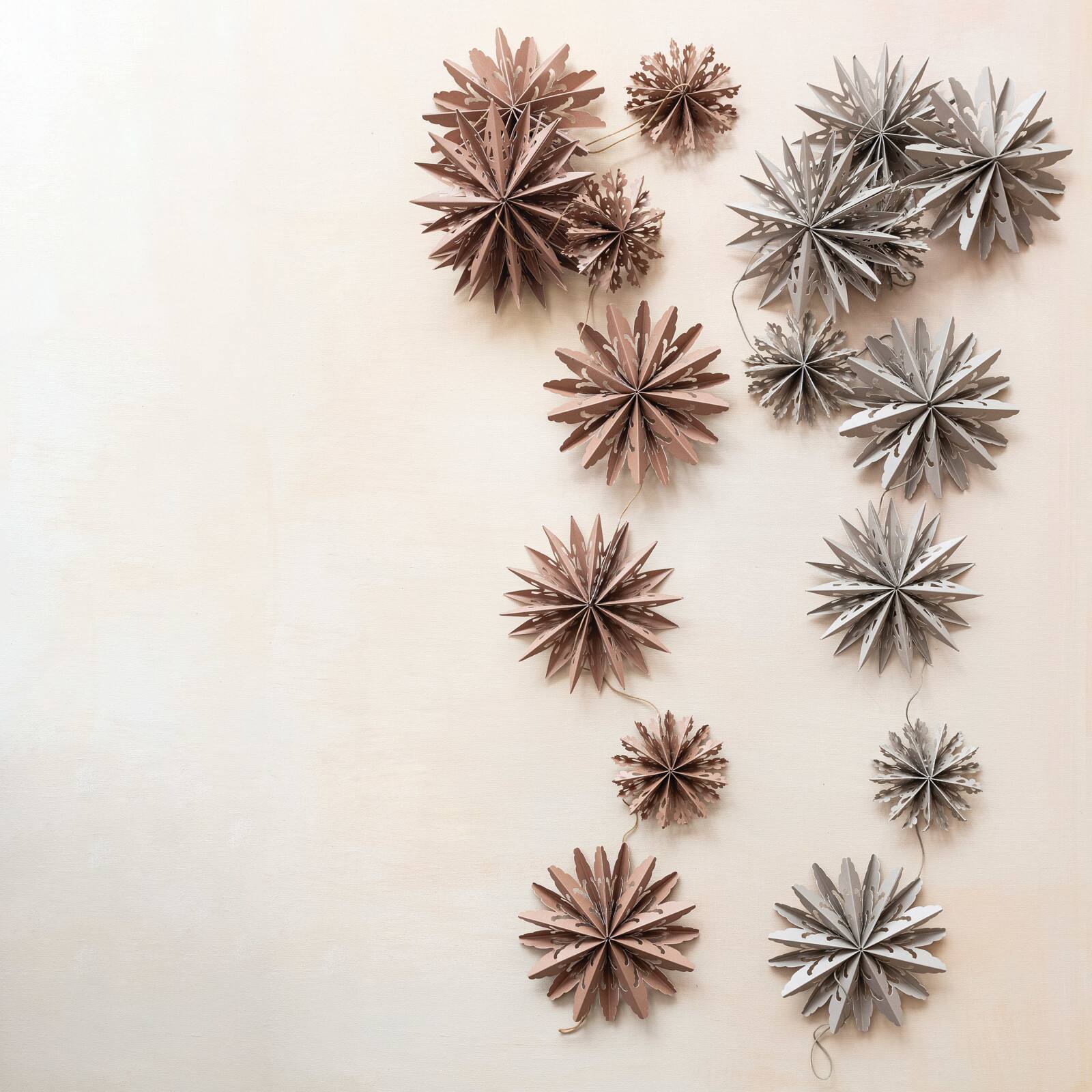Hello Honey&#xAE; 6ft. Brown Paper Snowflake Garland in Kraft Box