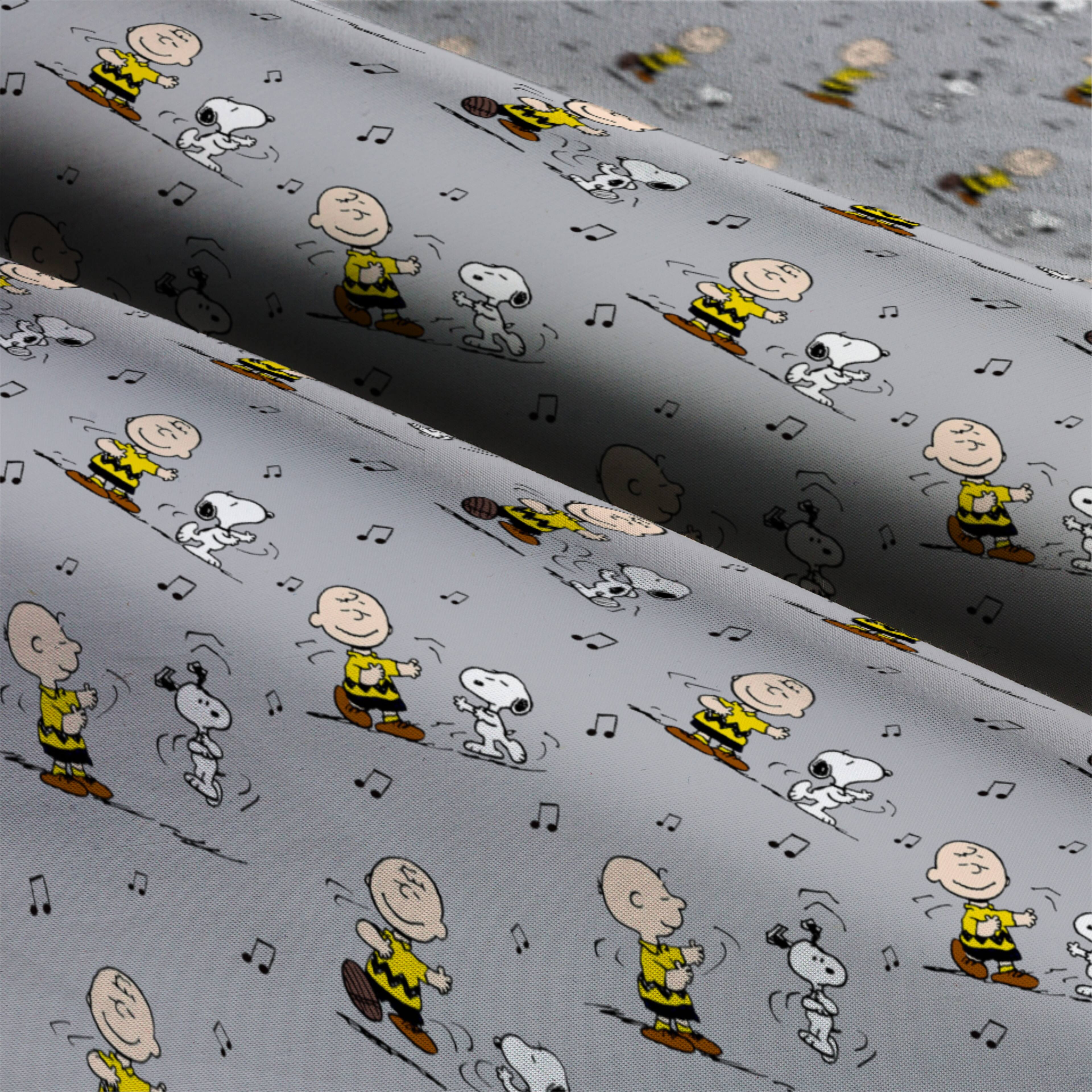 Peanuts® Charlie Brown & Snoopy Dance Cotton Fabric