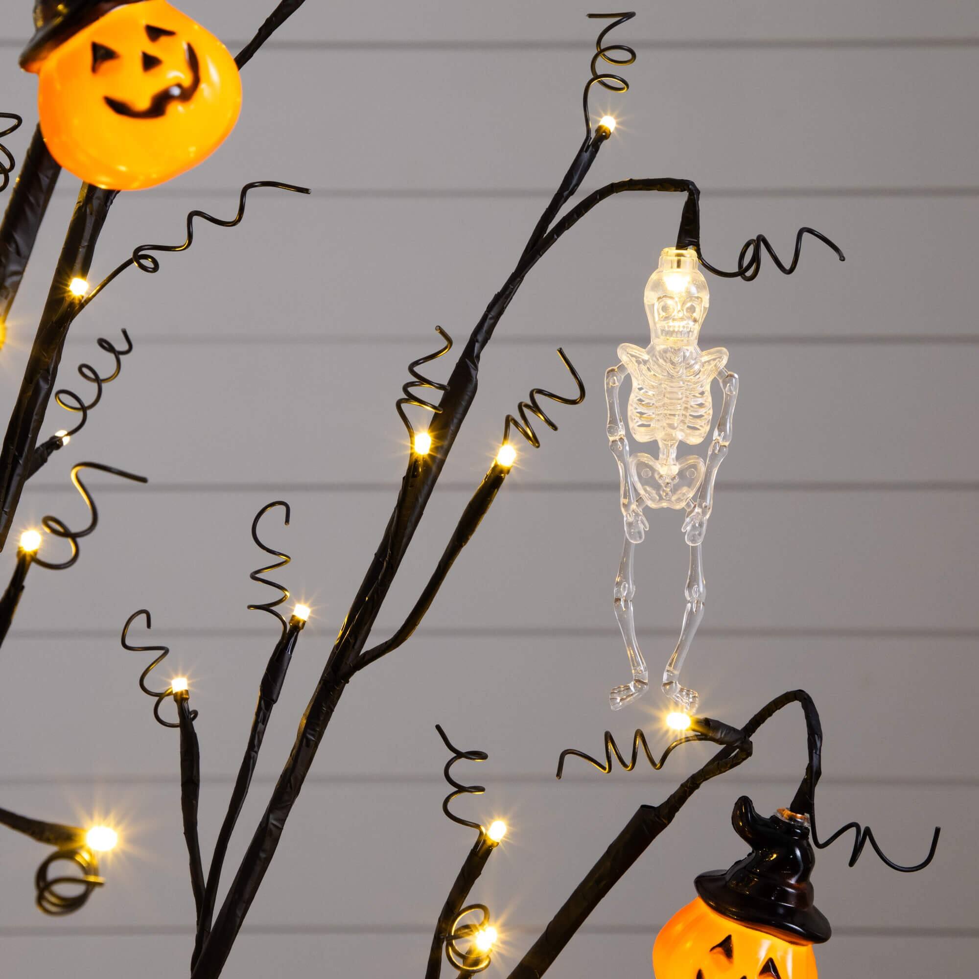 4ft. Pre-Lit Artificial Halloween Pumpkins and Skulls Ornament Tree with 64 Warm White LED Lights