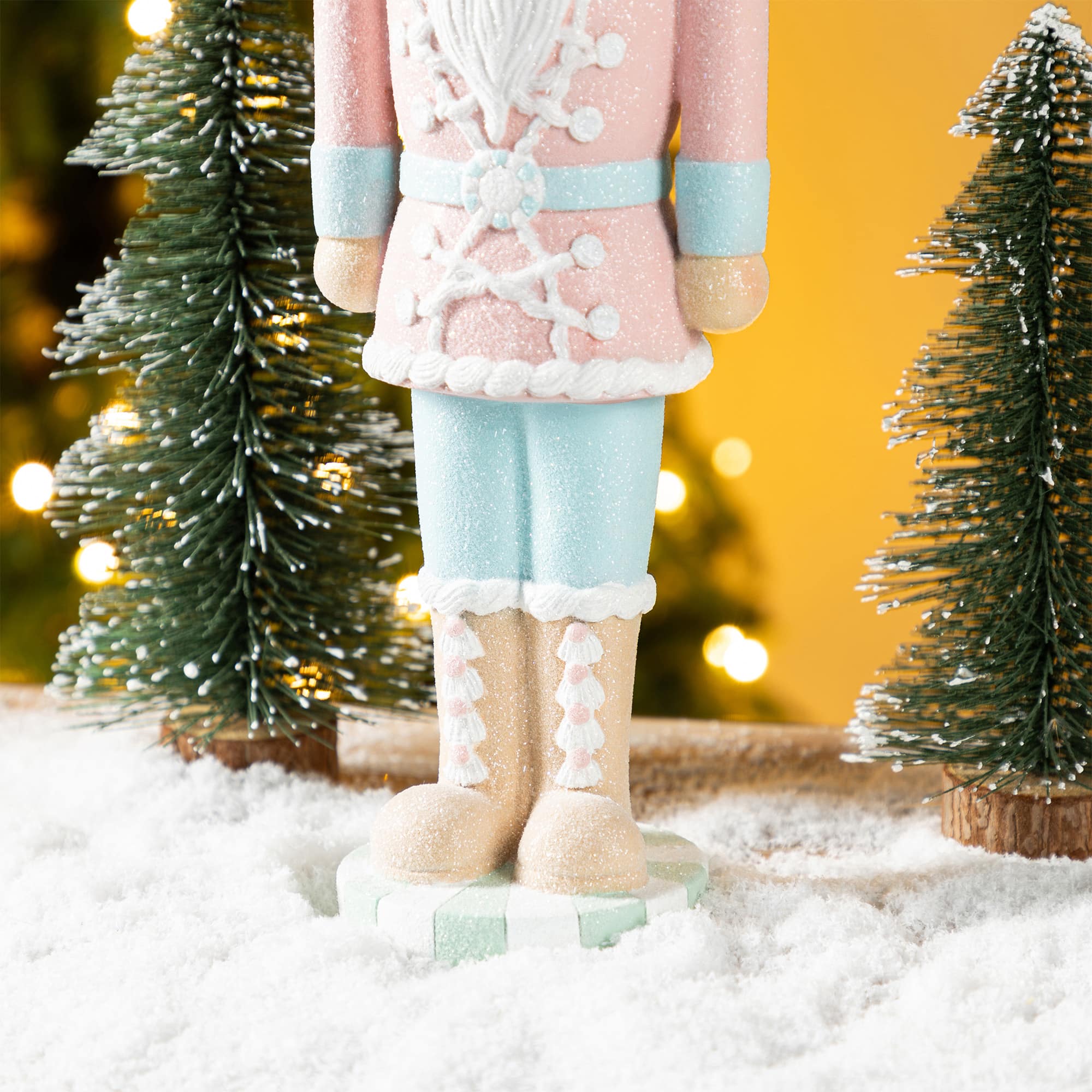 Glitzhome&#xAE; 18.25&#x22; Resin Christmas Cupcake Nutcracker Table Decor