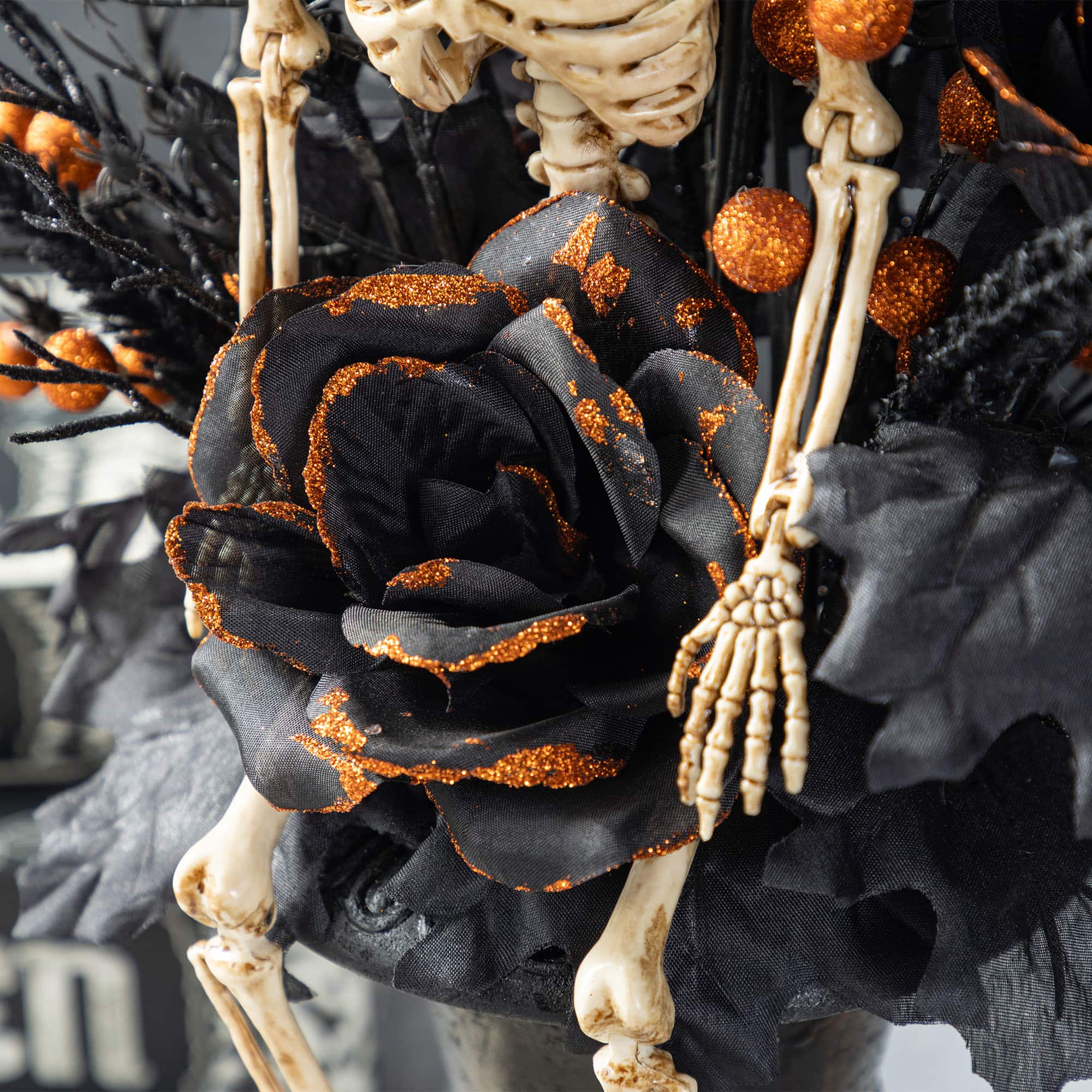 Glitzhome&#xAE; 22&#x22;H Halloween Black Rose, Skeleton and Berry Urn Table Tree
