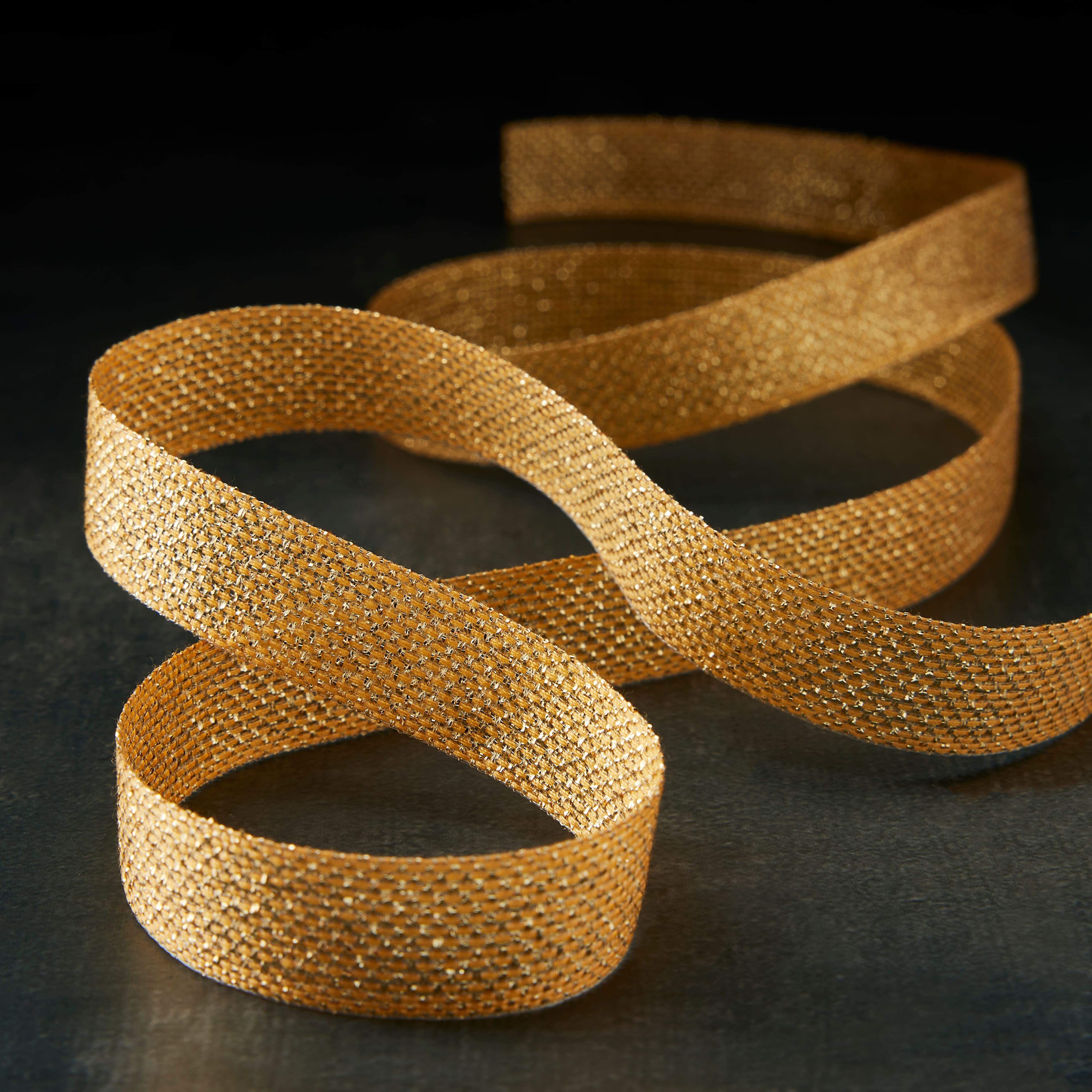 12 Pack: 5/8" x 7yd. Metallic Ribbon by Celebrate It®