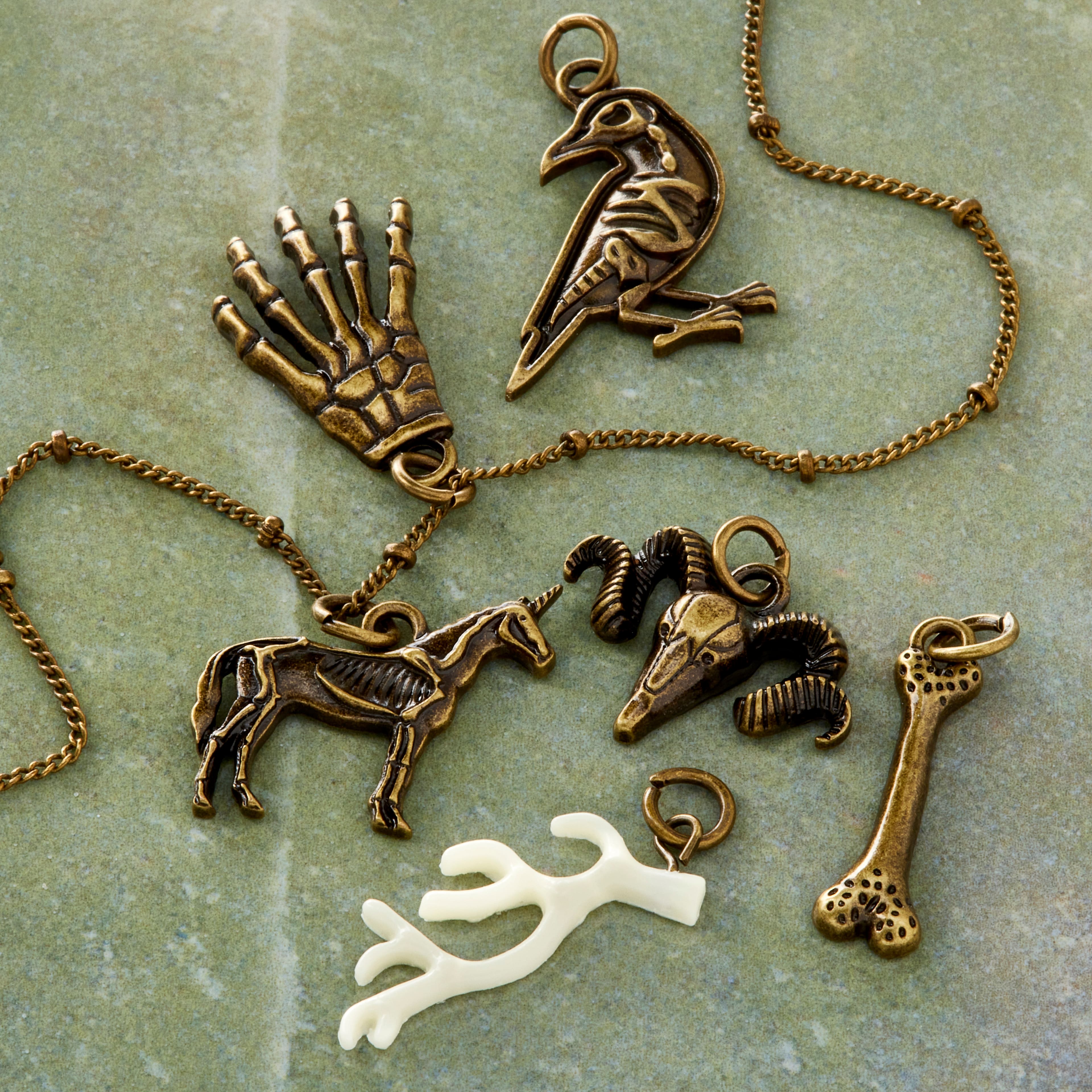 12 Packs: 6 ct. (72 total) Found Objects Metal Animal Bone Charms by Bead Landing&#x2122;