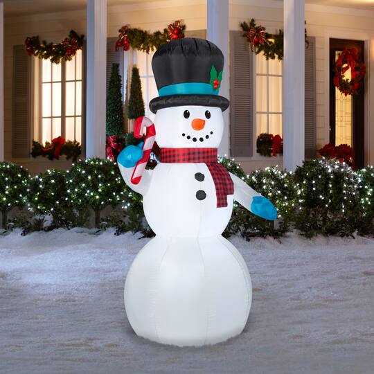 7ft. Airblown® Inflatable Snowman with Candy Cane | Christmas ...