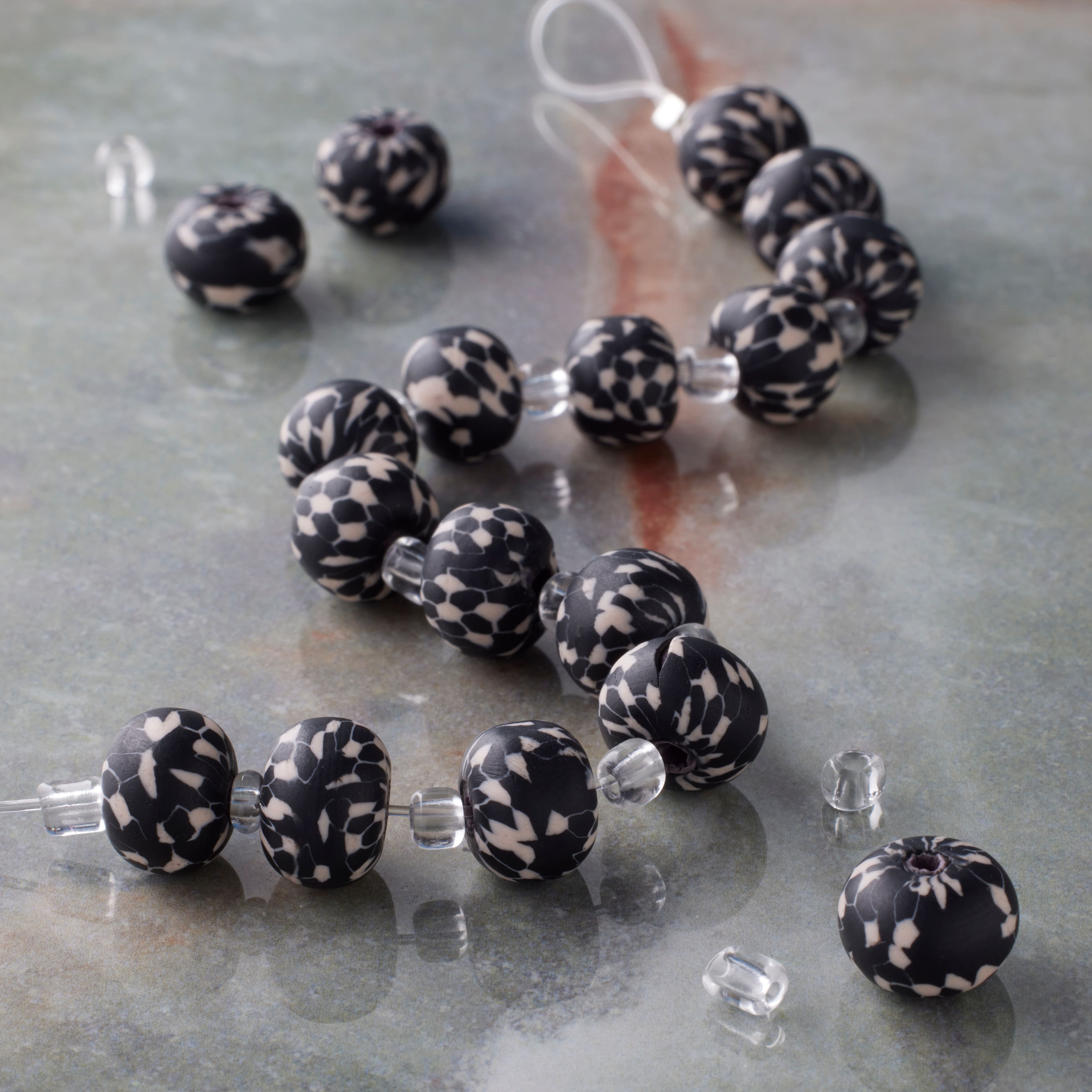 12 Pack: Black & White Clay Round Beads, 10mm by Bead Landing™