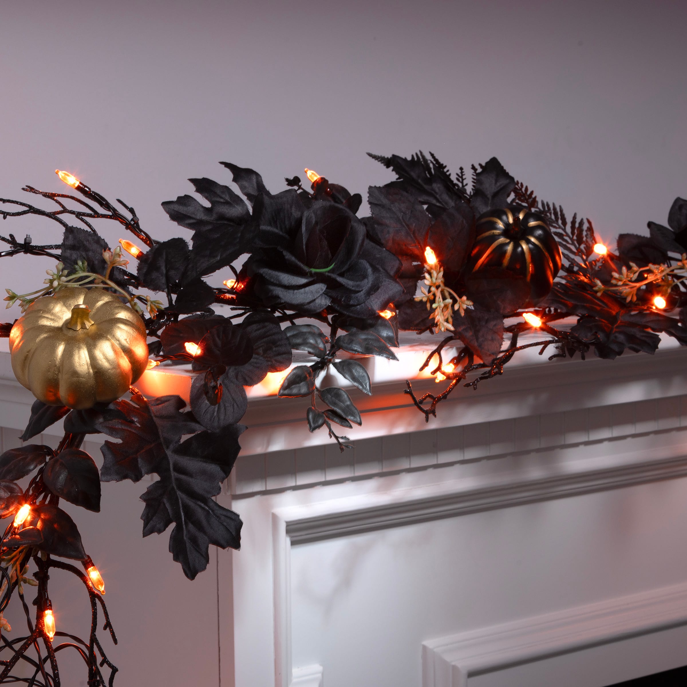 6ft. Chic Eek Black & Gold Halloween Pumpkin & Flower Pre-Lit LED Garland