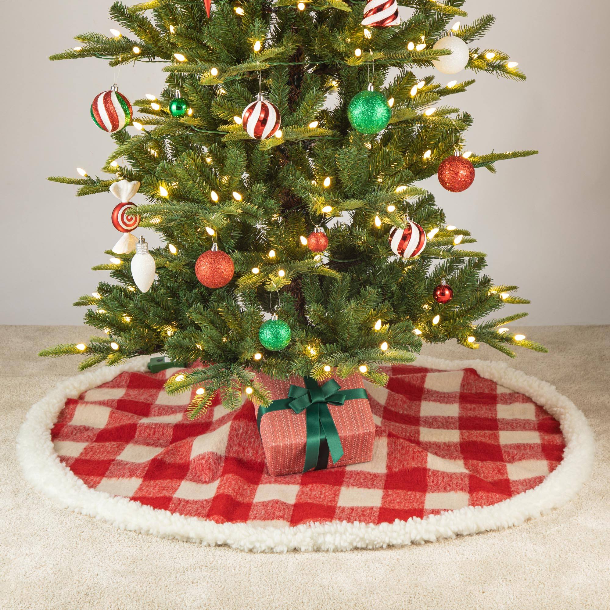 Glitzhome® 4ft. Red & White Plaid Reversible Sherpa & Flannel Christmas Tree Skirt