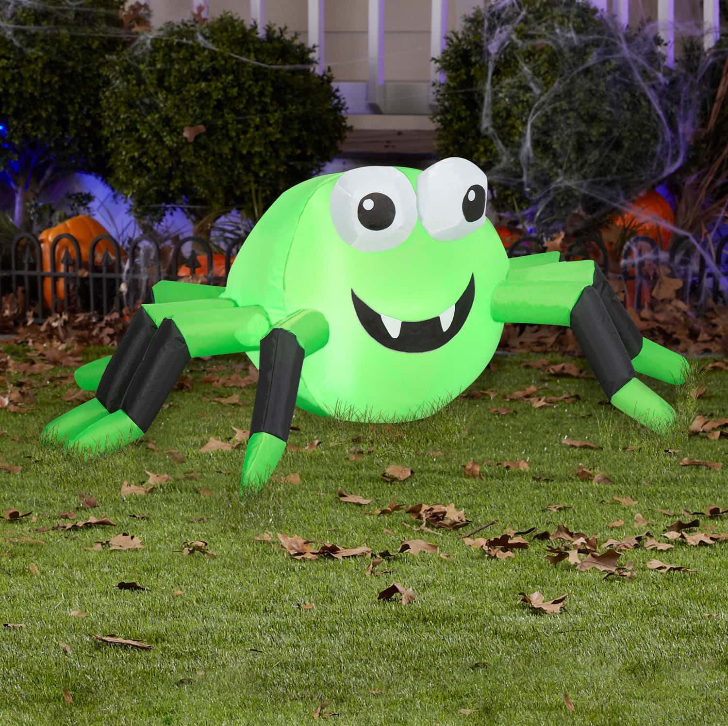 4ft. Airblown&#xAE; Inflatable Halloween Green &#x26; Black Spider with LED Lights