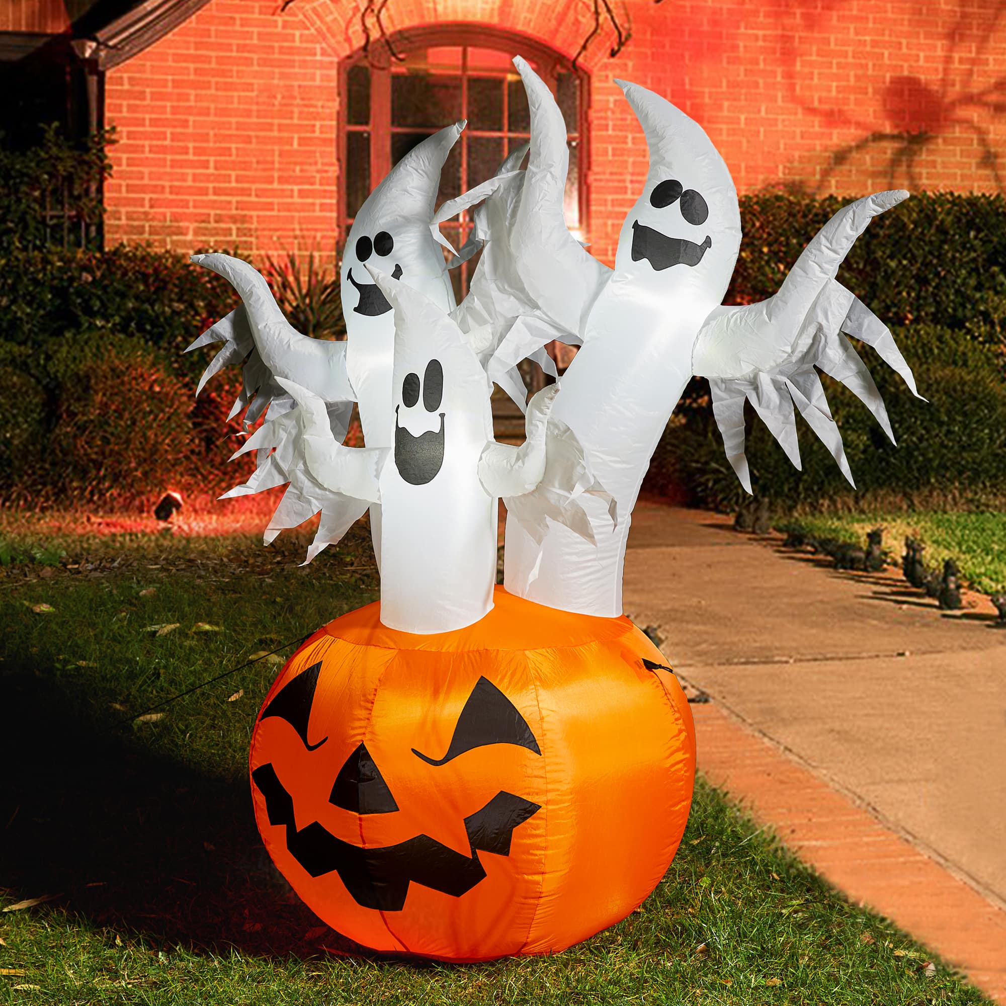 Glitzhome&#xAE; 6ft. Lighted 3 Ghosts In Jack-O&#x27;-Lantern Pumpkin with Scream Inflatable D&#xE9;cor