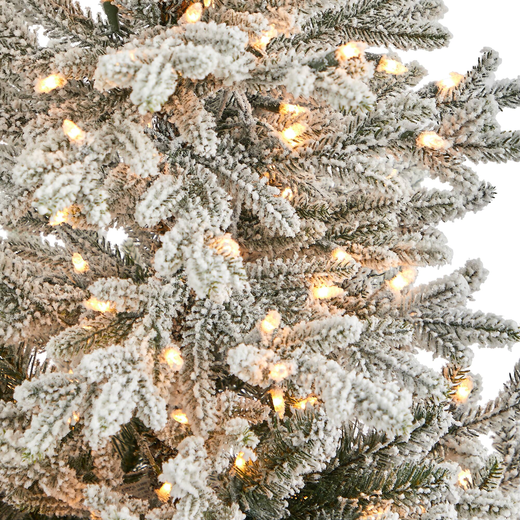 4.75ft. Pre-Lit Flocked Fraser Fir Artificial Christmas Tree in Tower Planter, Warm White Lights