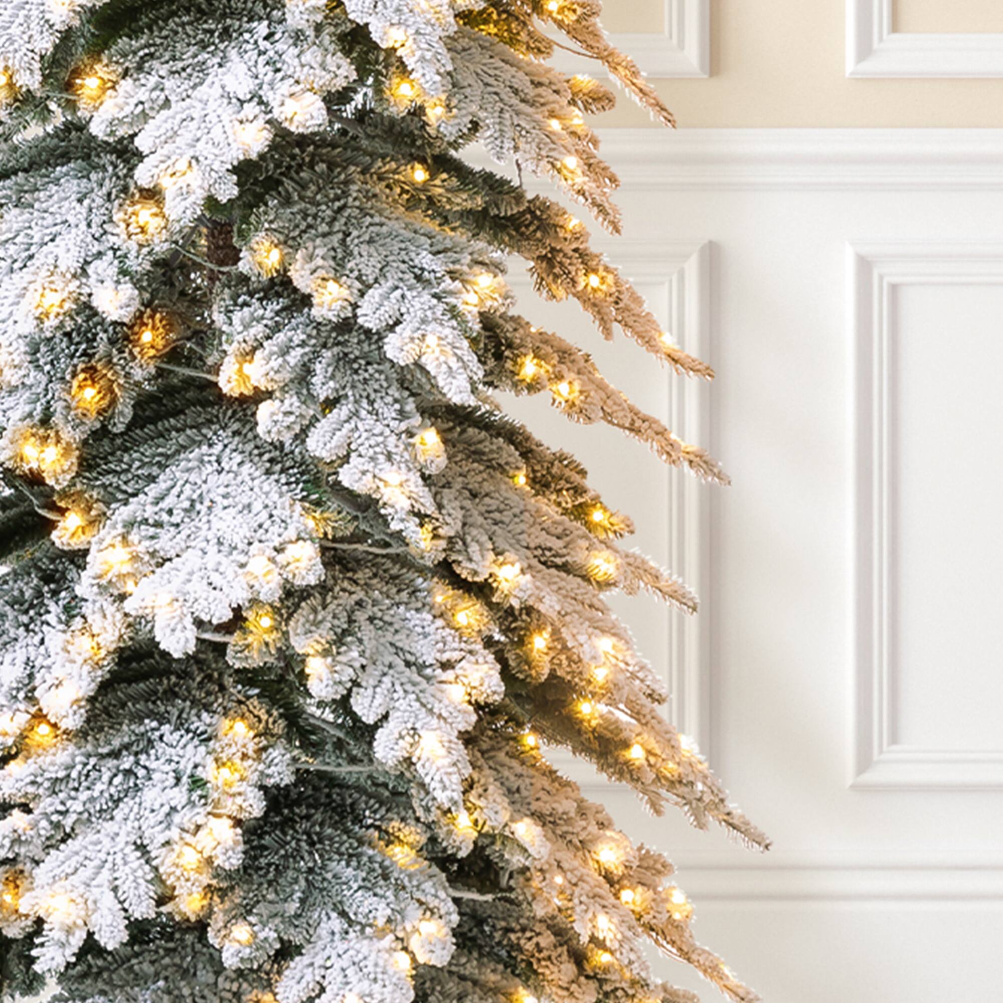 11ft. Pre-Lit Flocked Spruce Artificial Christmas Tree, Warm White Lights