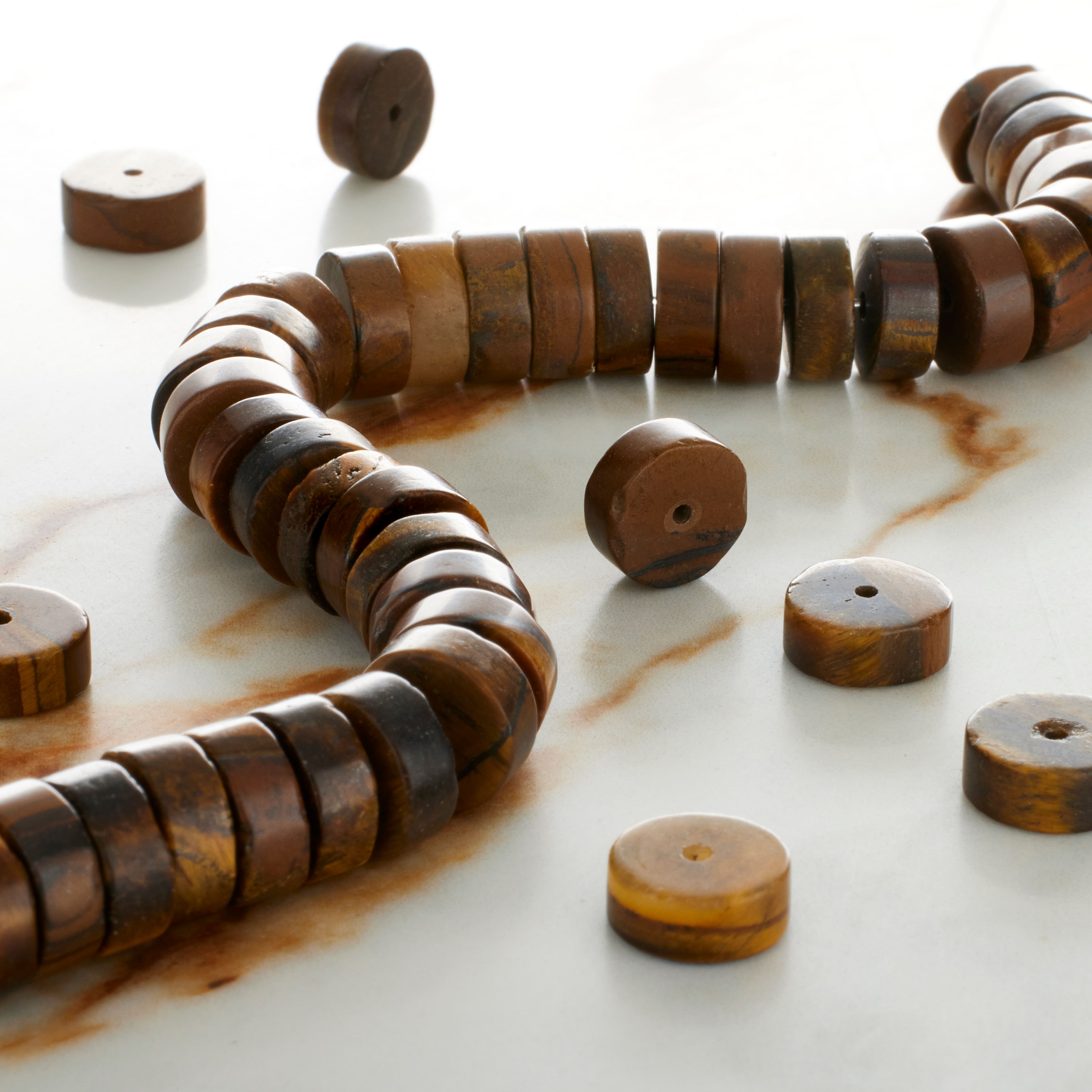 12 Pack: Tiger's Eye Heishi Beads by Bead Landing™