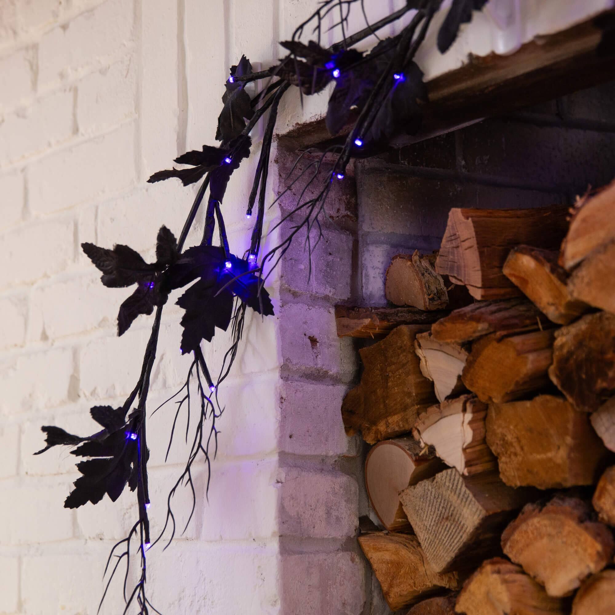 6.5ft. Pre-Lit Artificial Halloween Black Maple Garland with 48 Orange & Purple LED Lights