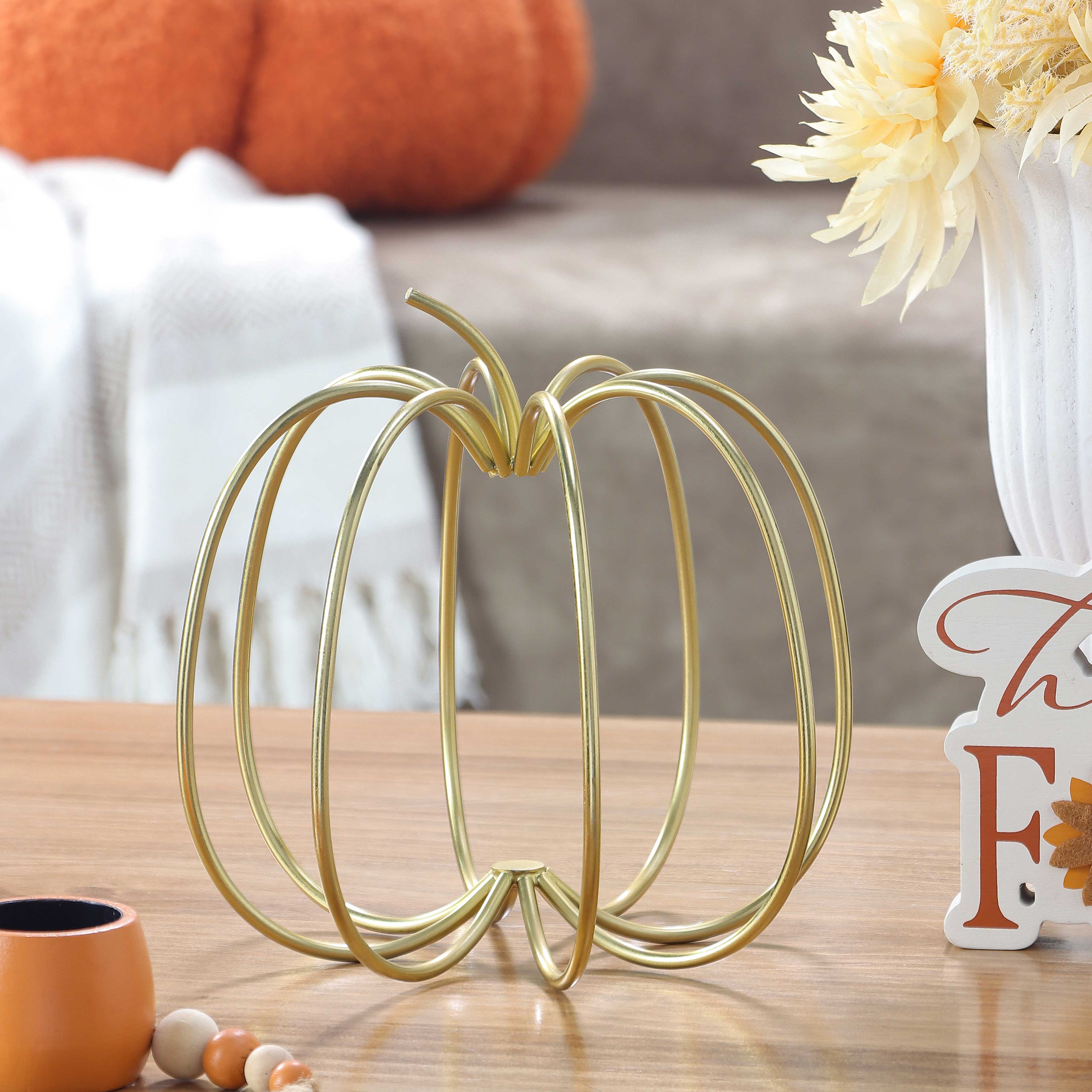 7.5&#x22; Gold Metal Pumpkin Tabletop D&#xE9;cor by Ashland&#xAE;