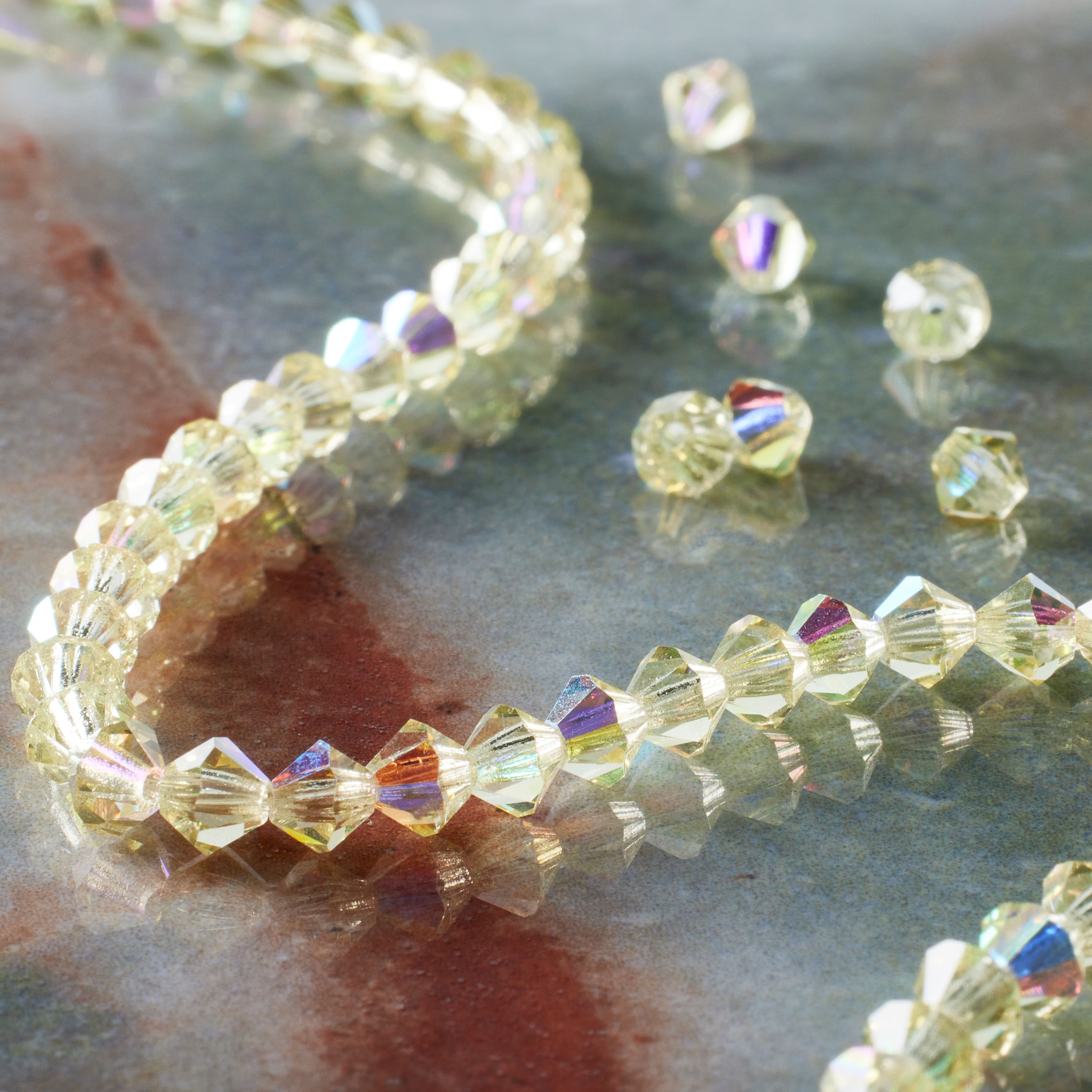 12 Pack: Preciosa® Czech Crystal Bicone Beads, 4mm by Bead Landing™