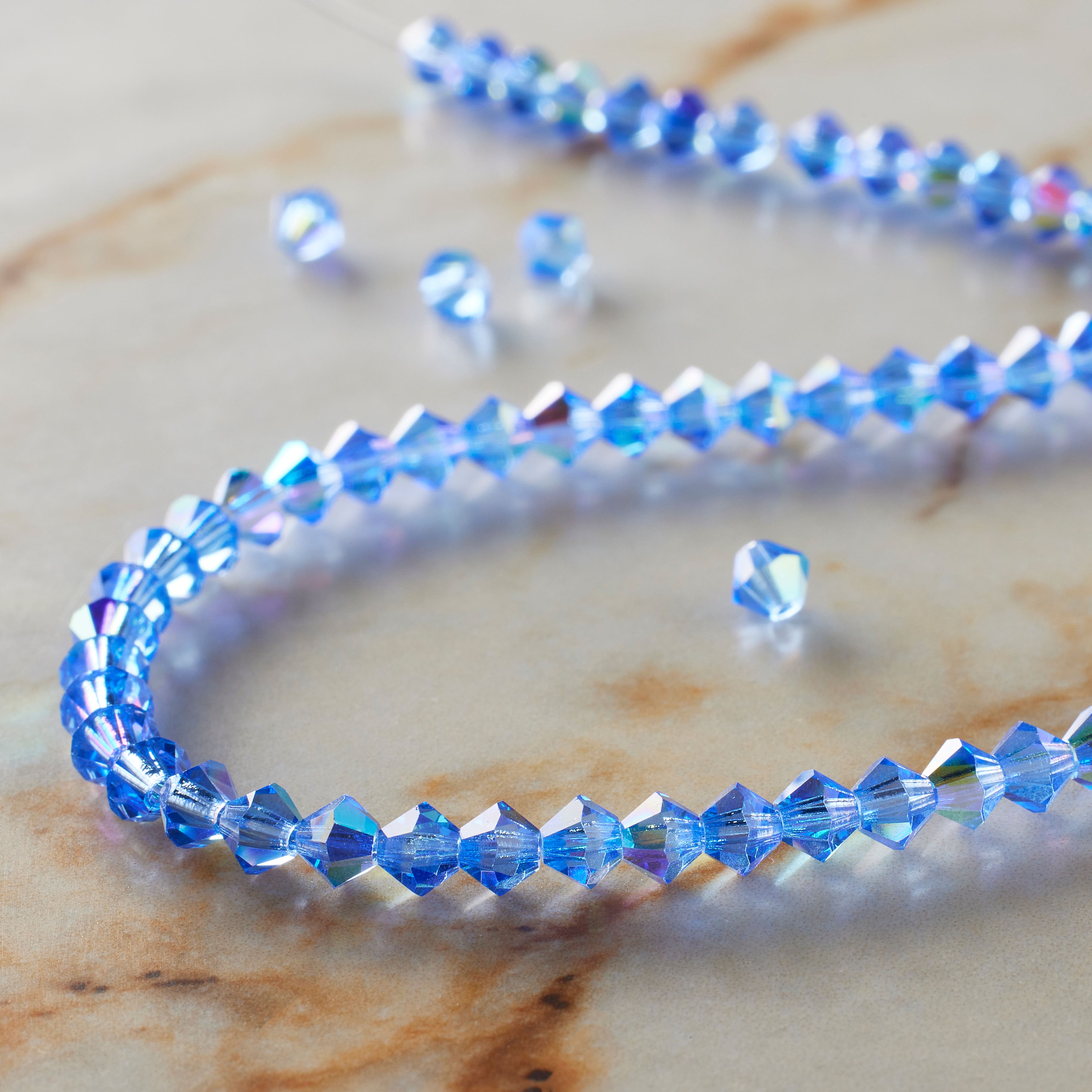 12 Pack: Preciosa Glass Crystal Bicone Beads, 4mm by Bead Landing&#x2122;