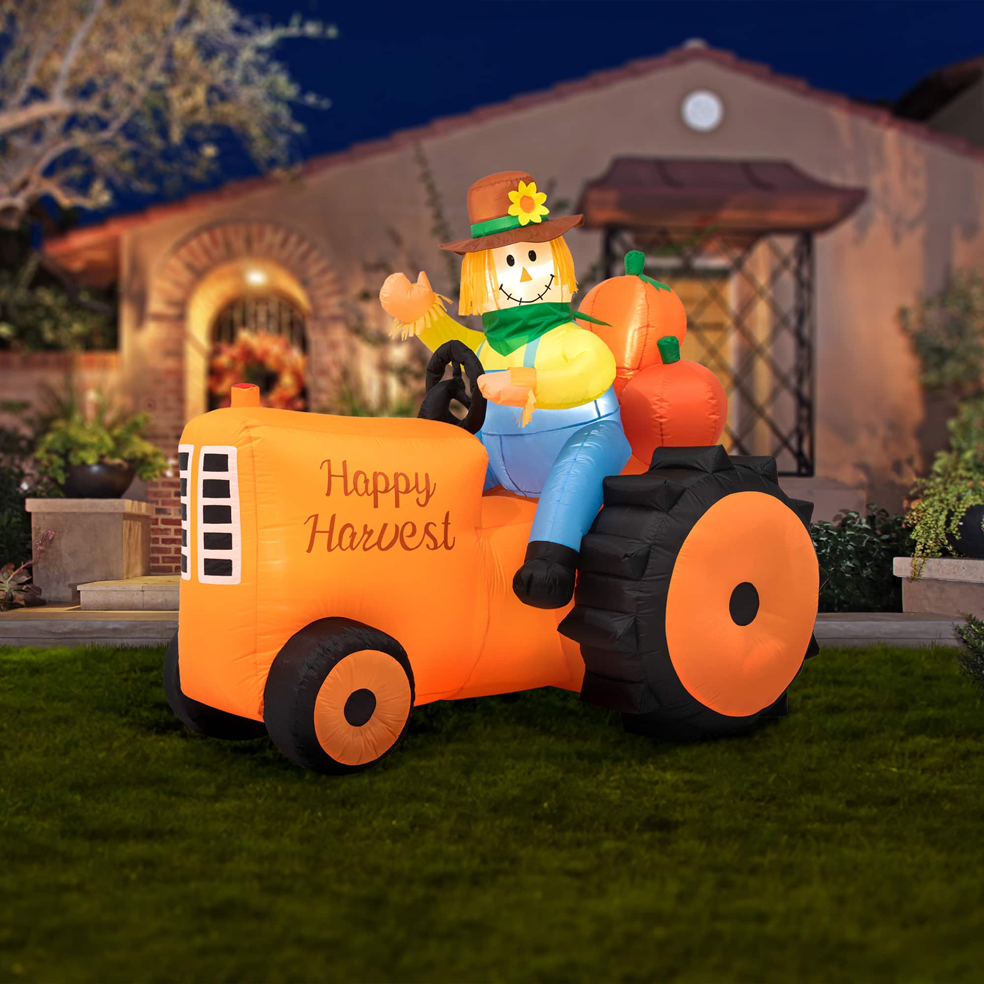 Glitzhome&#xAE; 7ft. Fall Lighted Inflatable Tractor D&#xE9;cor