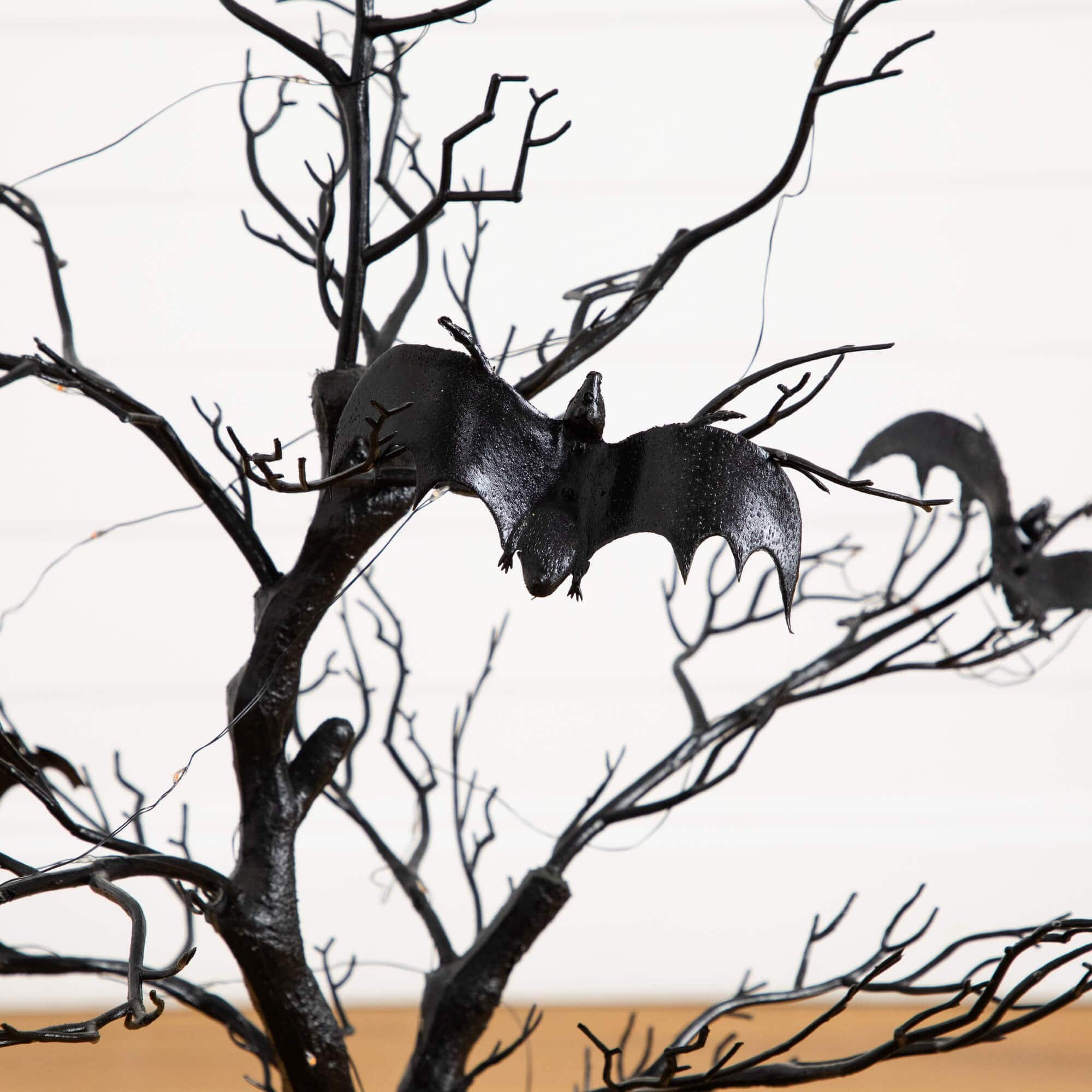 3ft. Pre-Lit Artificial Halloween Black Spooky Twig Tree with Bats and 100 Orange &#x26; Purple LED Lights