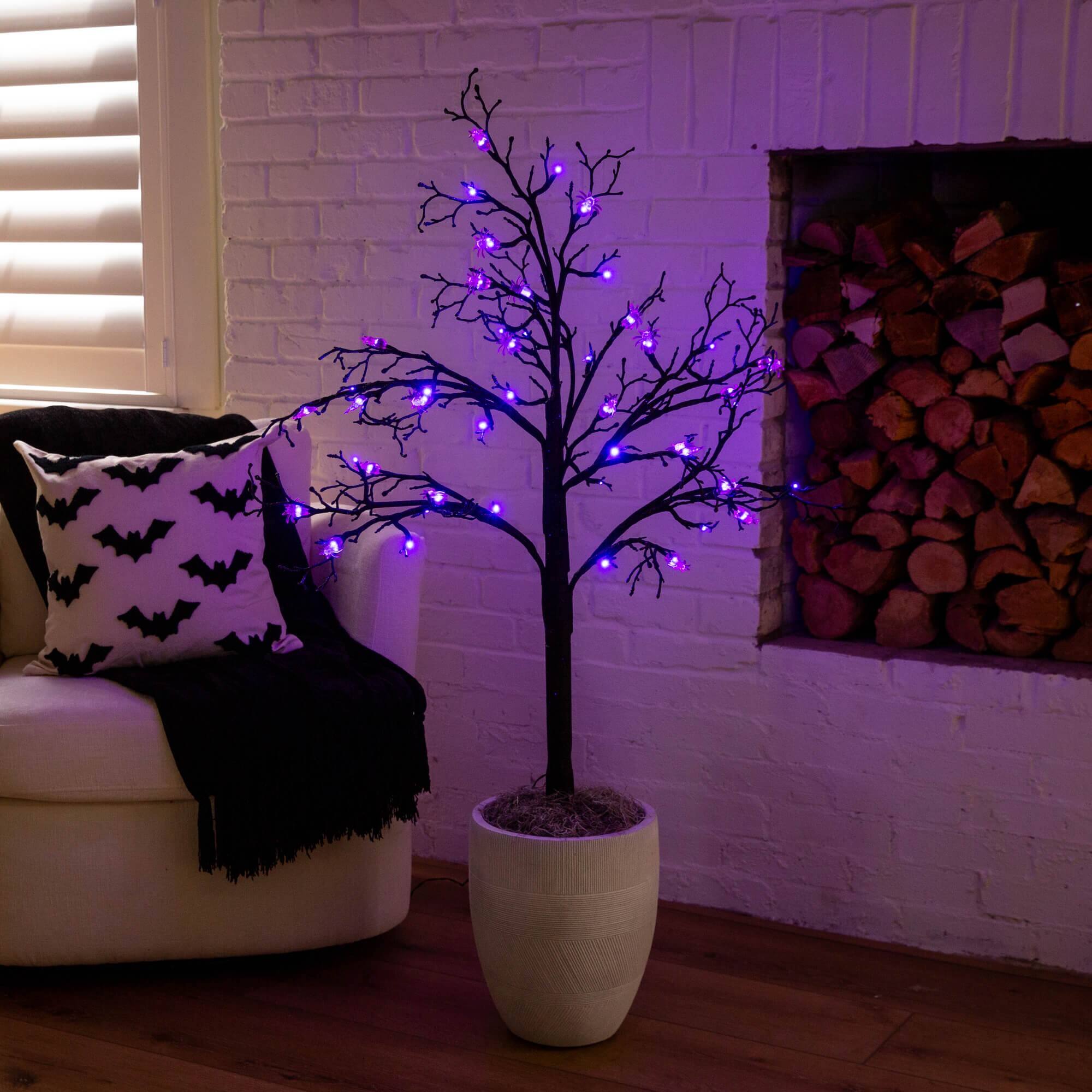 4ft. Pre-Lit Artificial Halloween Spider Twig Tree with 48 Purple LED Lights